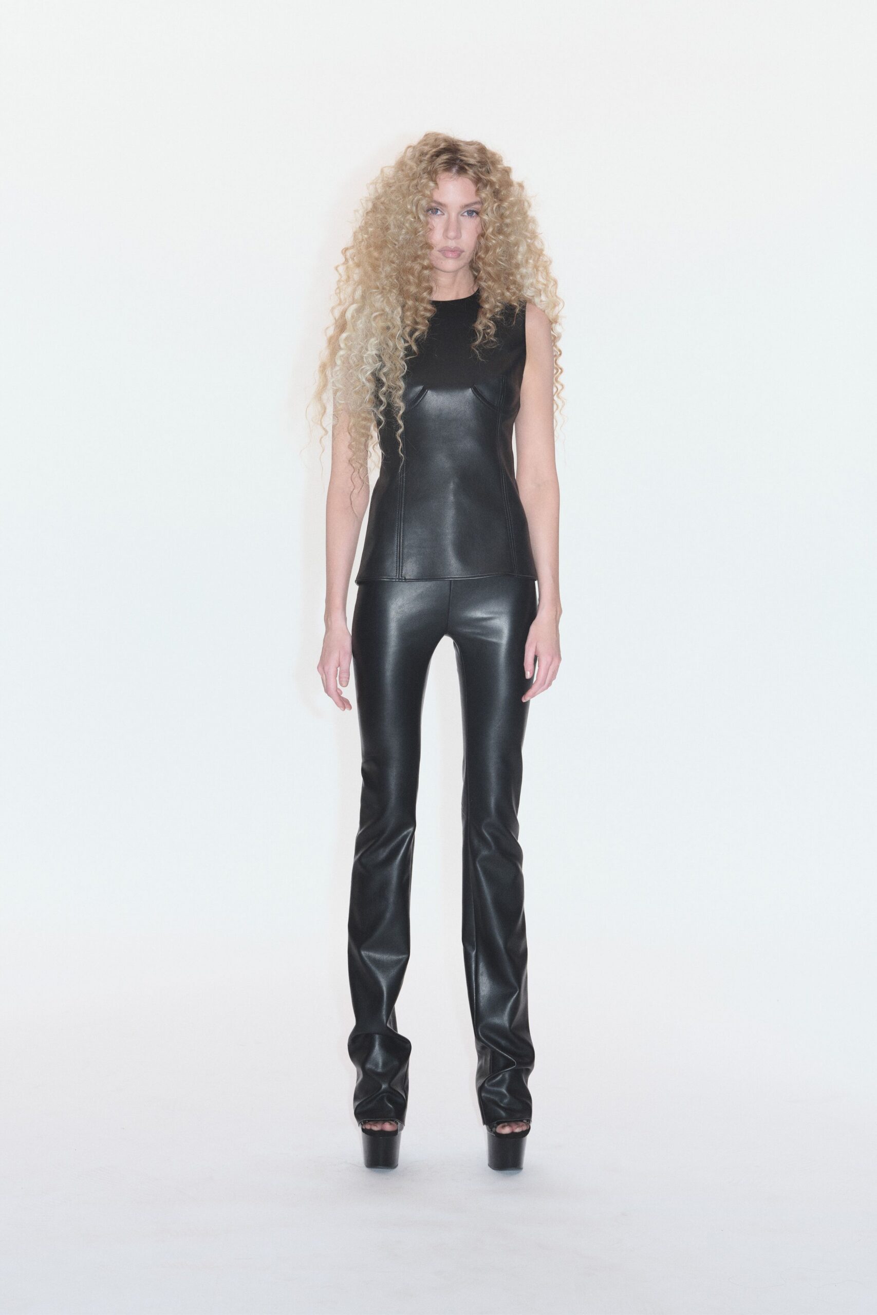 black leather fitted top and pants