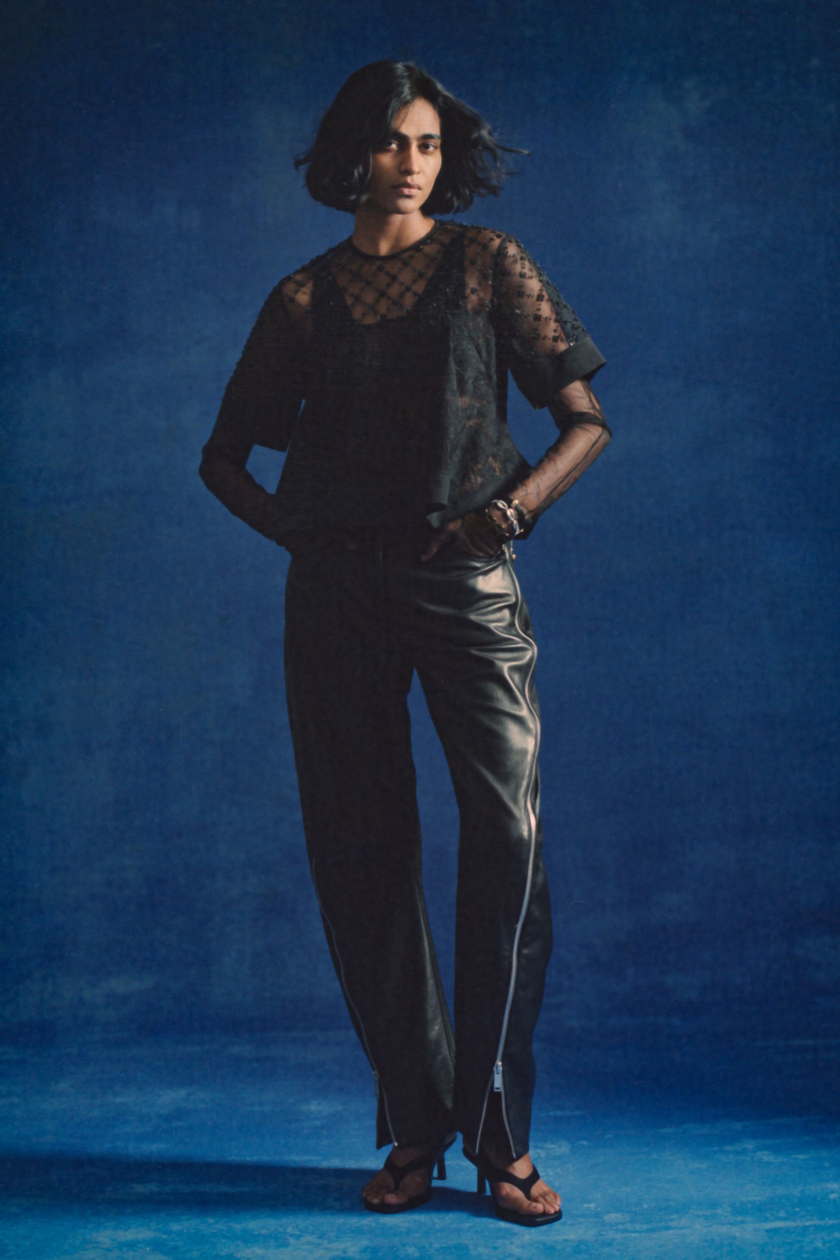 black lace short-sleeve v-neck relaxed pleated sheer top