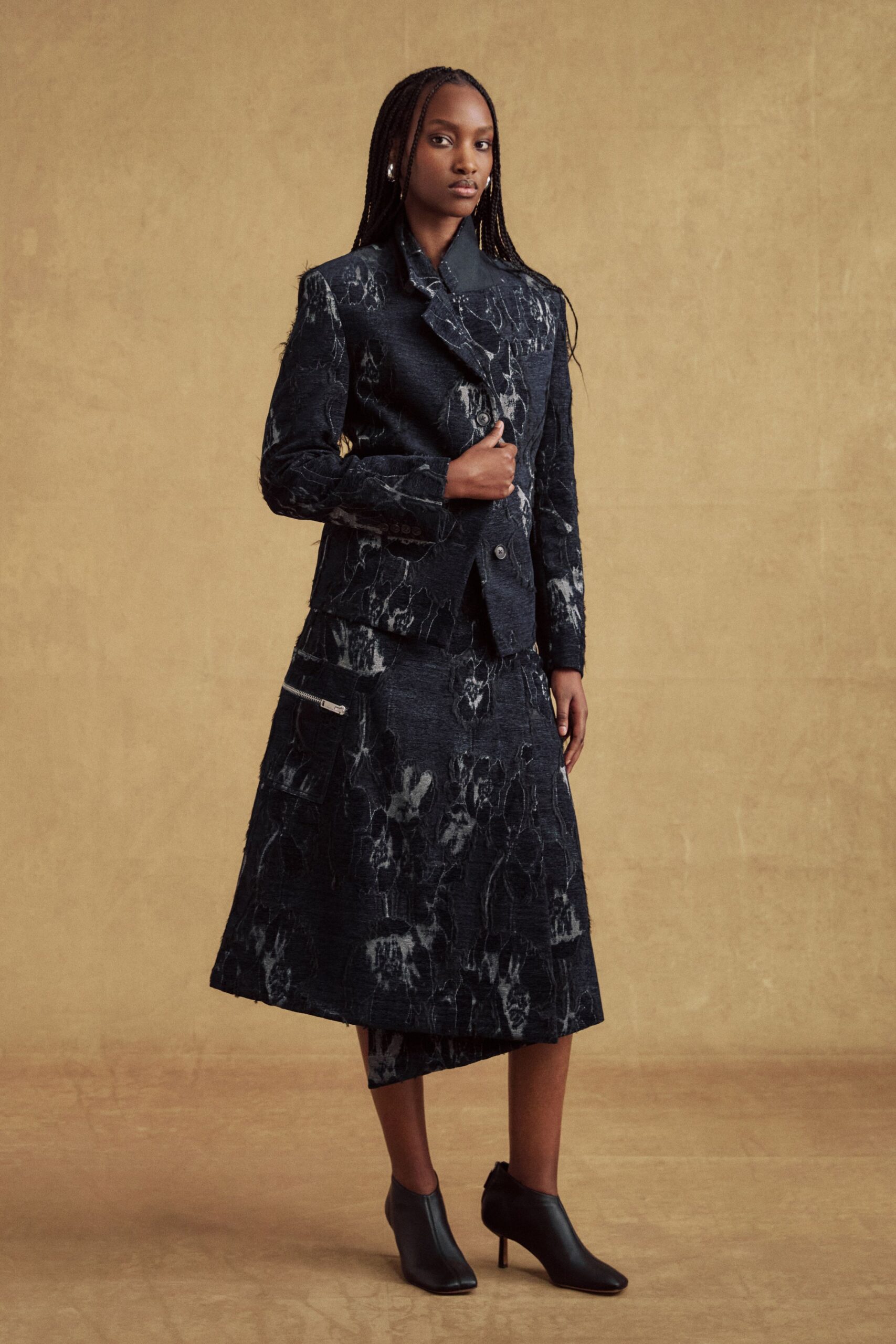 black structured blazer and midi skirt