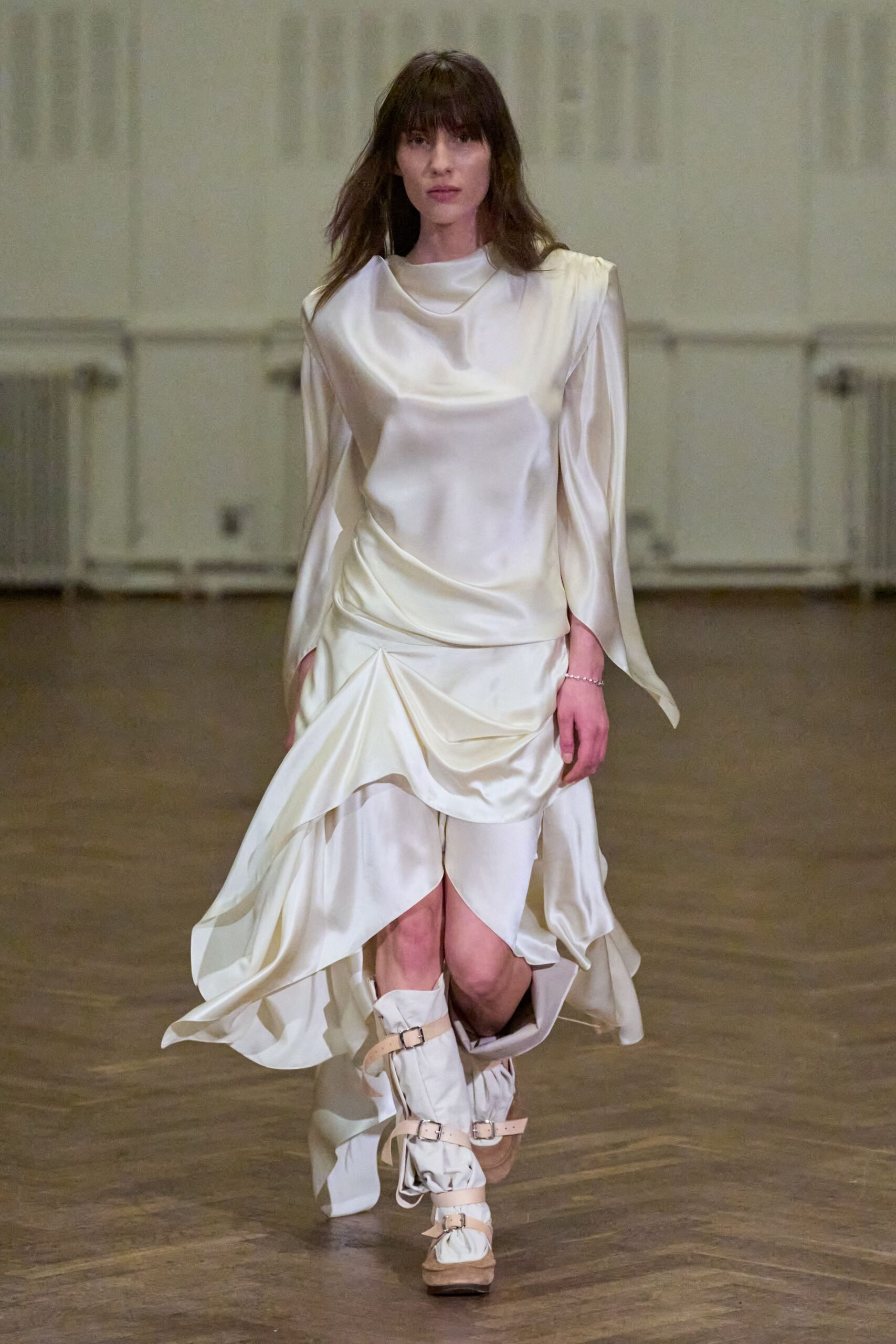 white silk asymmetric dress with boots