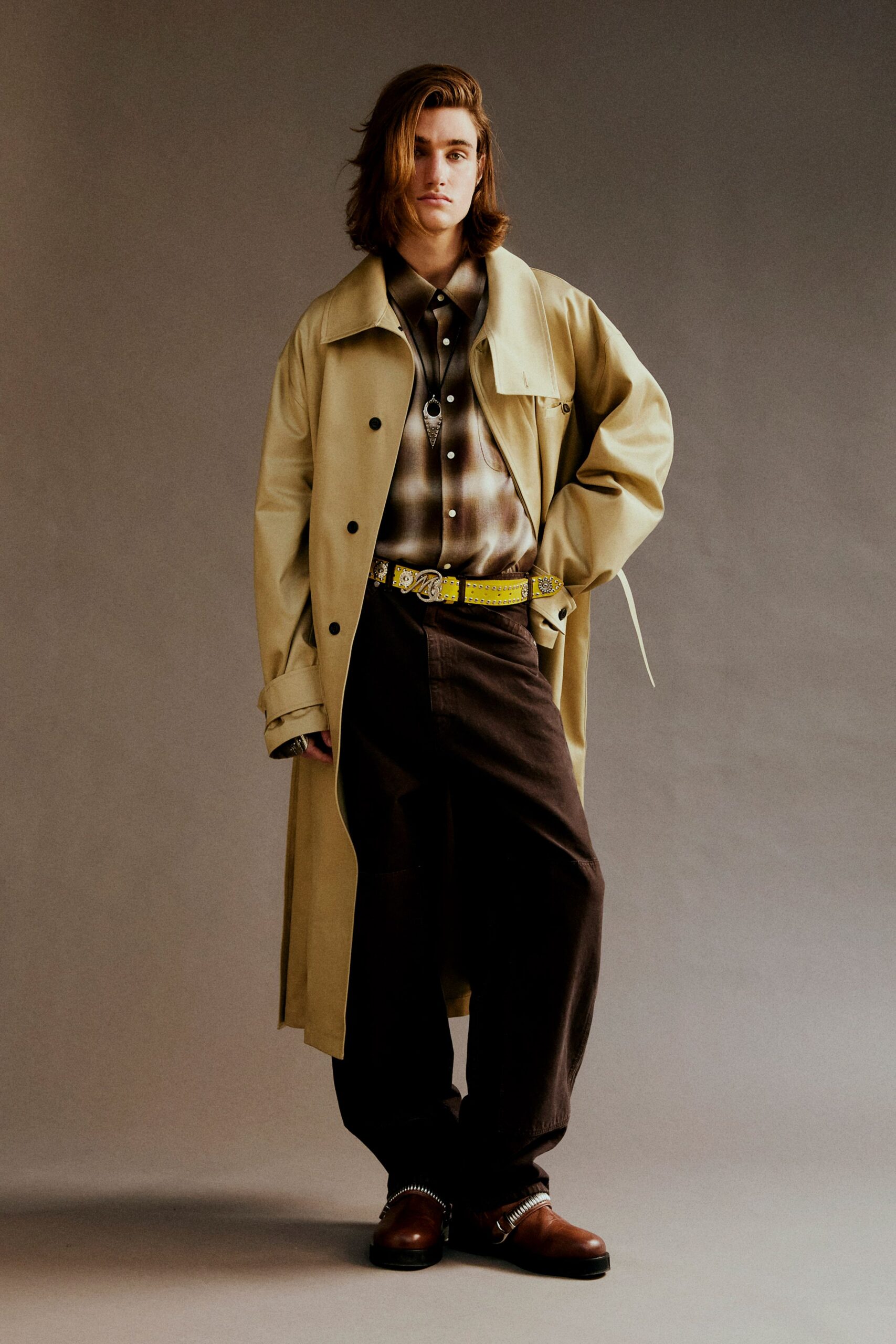 beige trench coat with brown shirt
