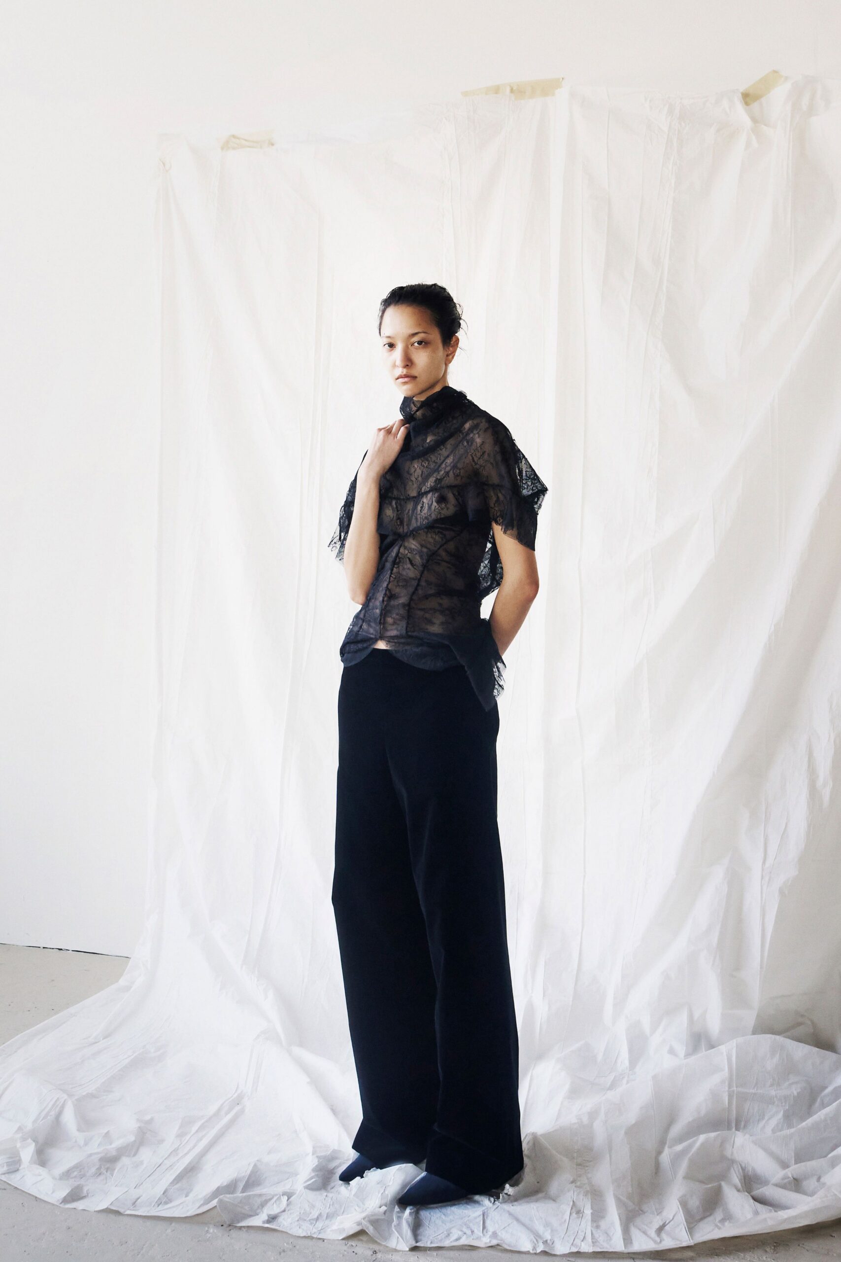 black lace short-sleeve collared fitted ruffled sheer top