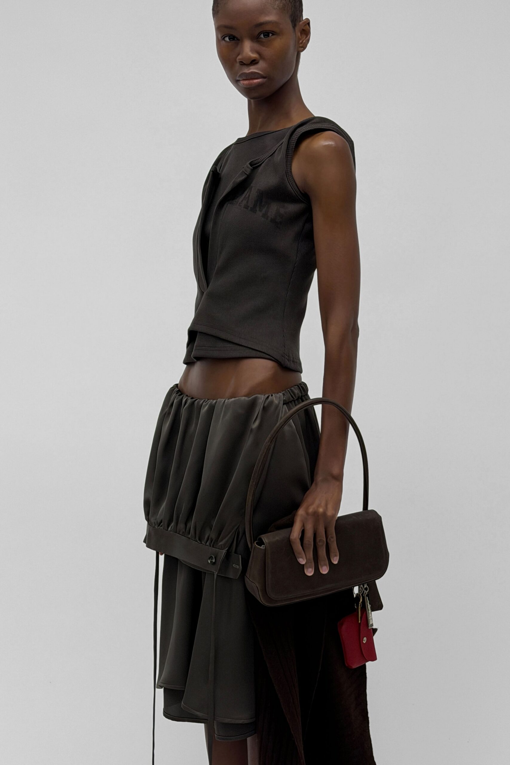 brown fitted top gray relaxed skirt