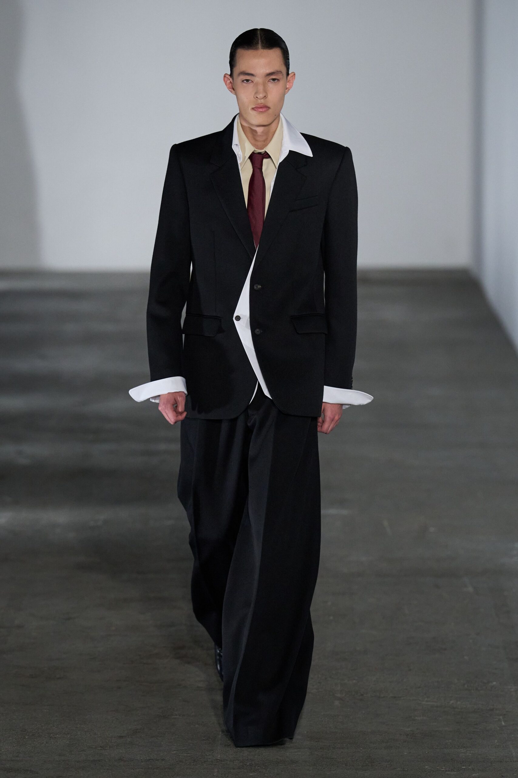 black wool long-sleeve collared tailored buttoned suit