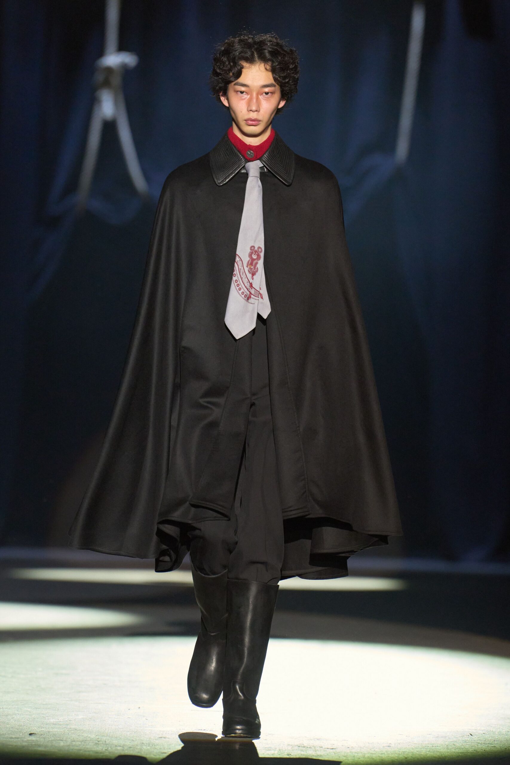 black wool cape with red shirt