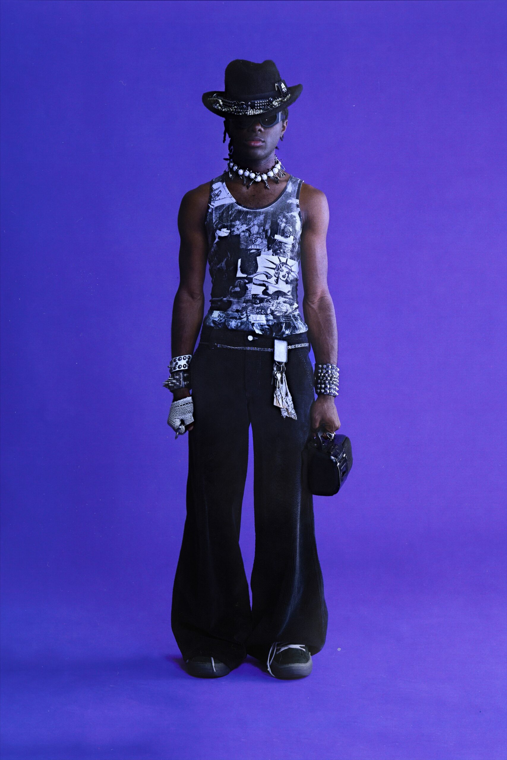 black tank-top and flared pants