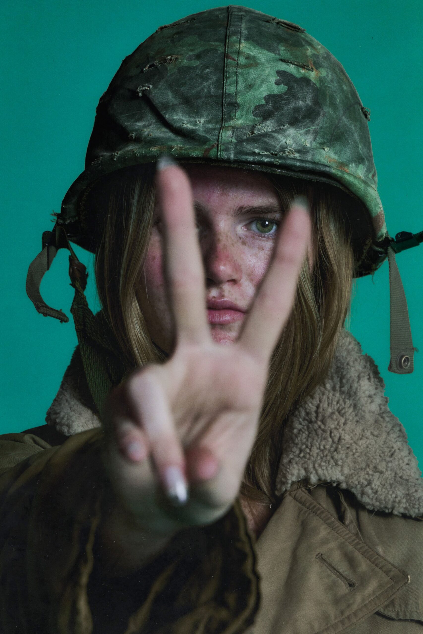 brown relaxed coat with camouflage hat