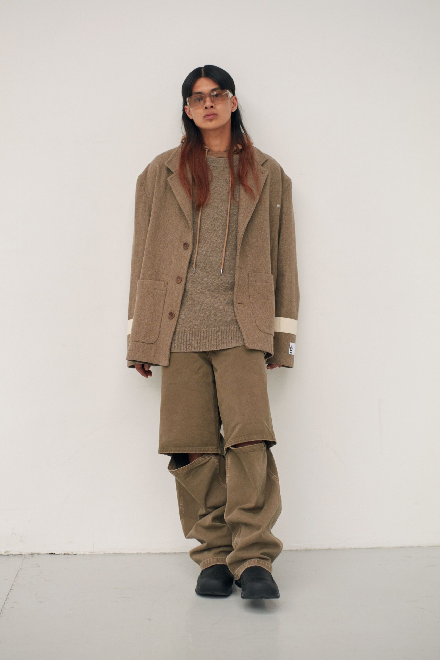 brown wool long-sleeve collared relaxed buttoned pockets jacket