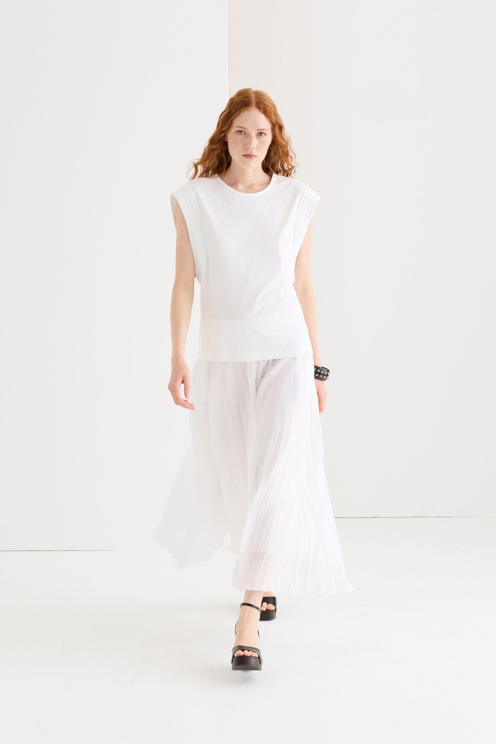 white cotton top with pleated skirt