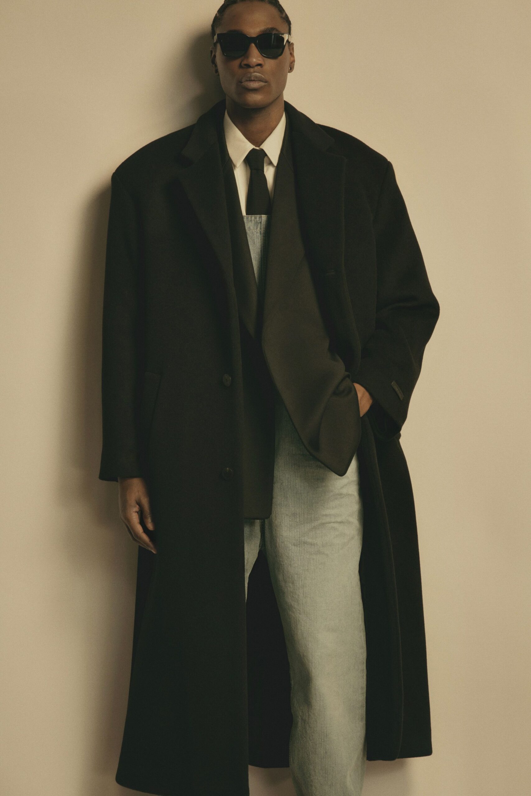 black wool coat with denim pants