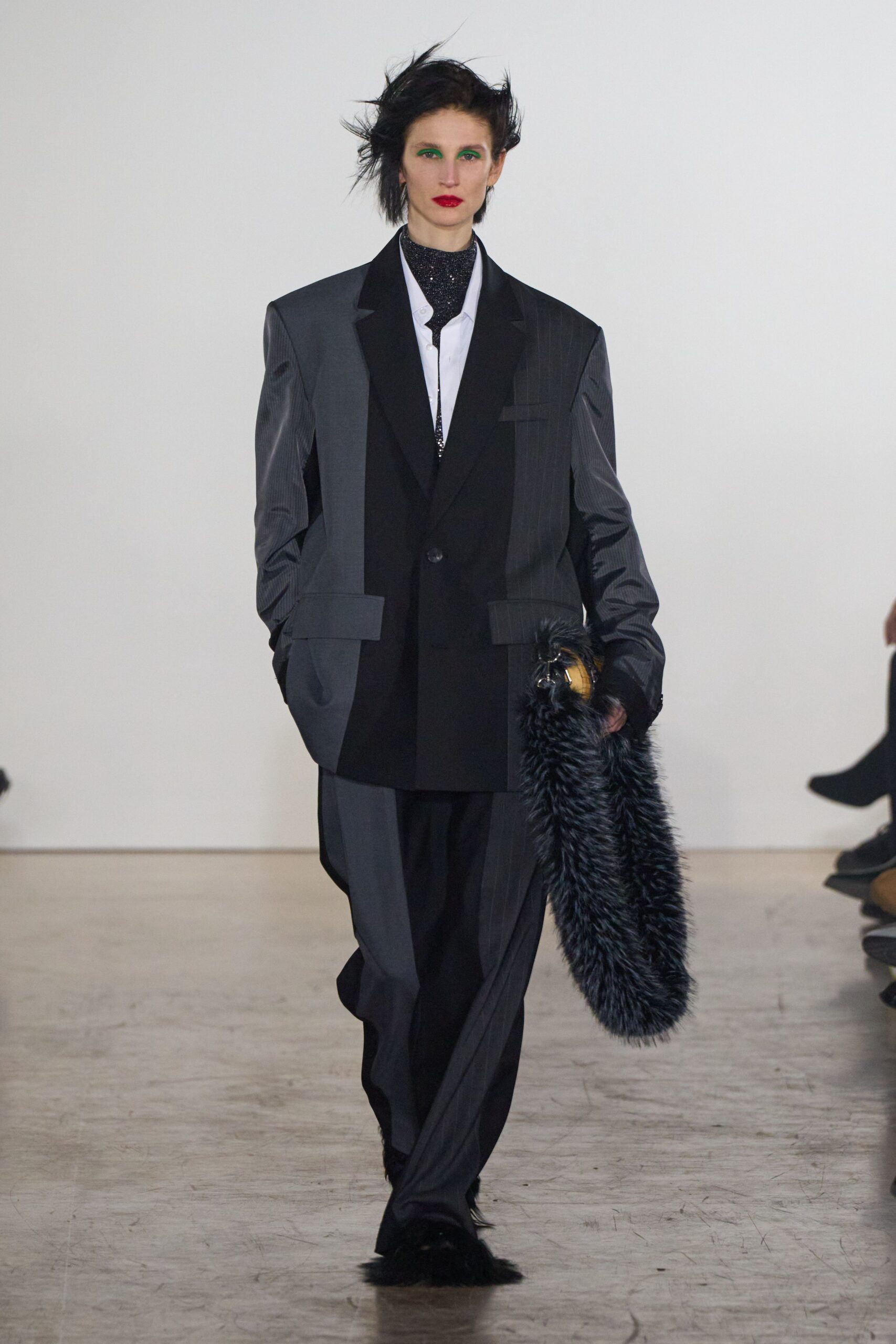 black wool long-sleeve collared oversized buttoned layered suit