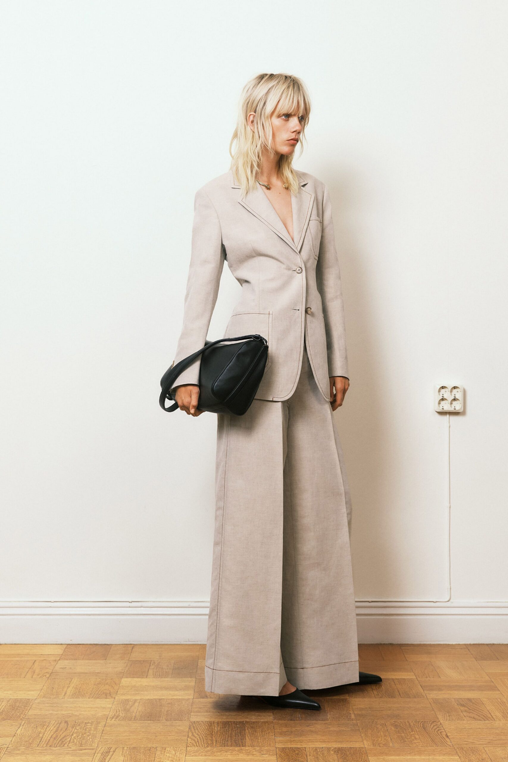beige tailored blazer and relaxed pants