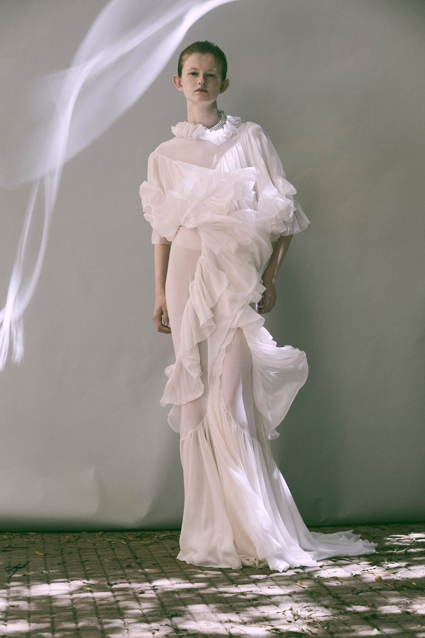white silk ruffled gown