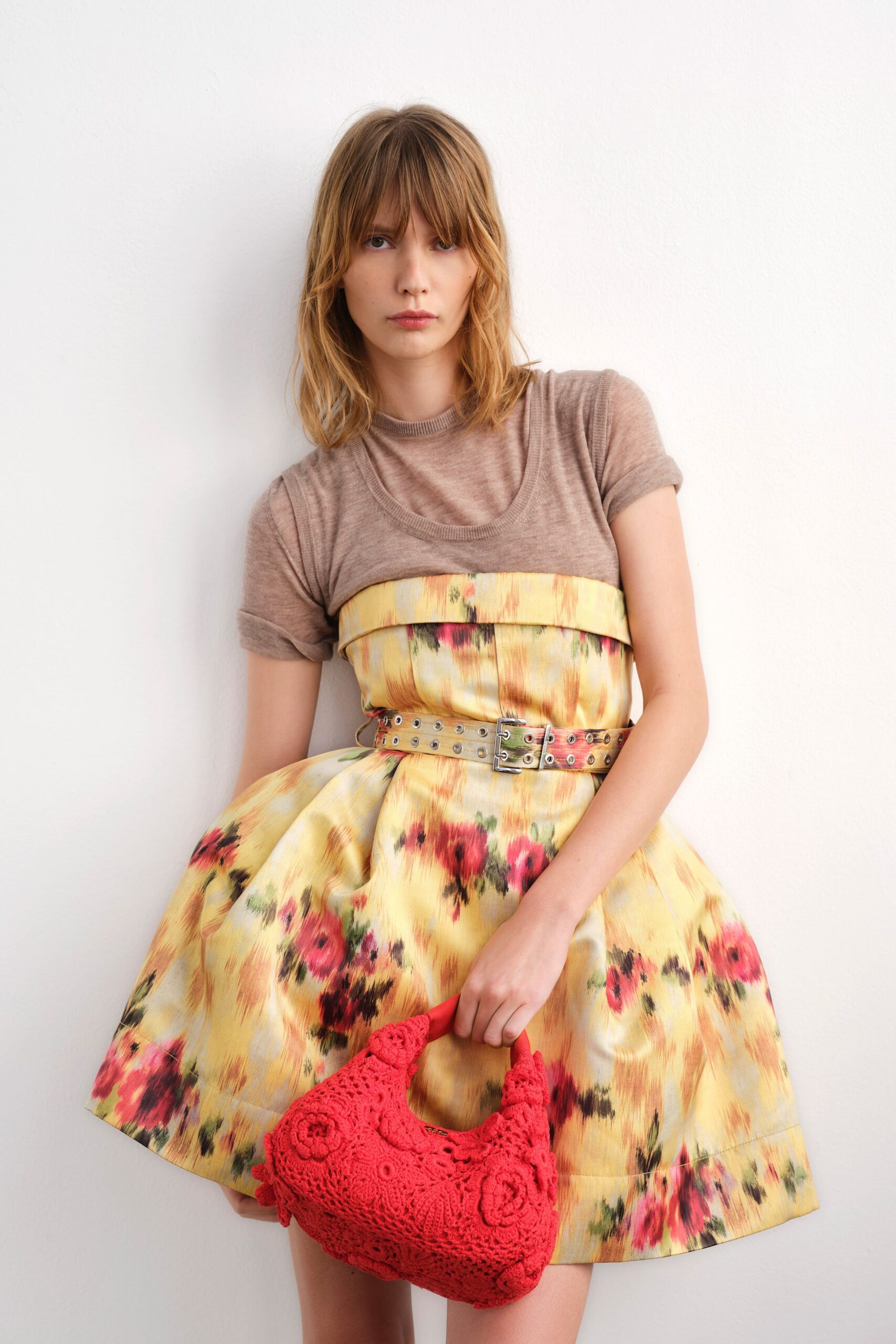 yellow cotton sleeveless collared fitted pleated flared dress