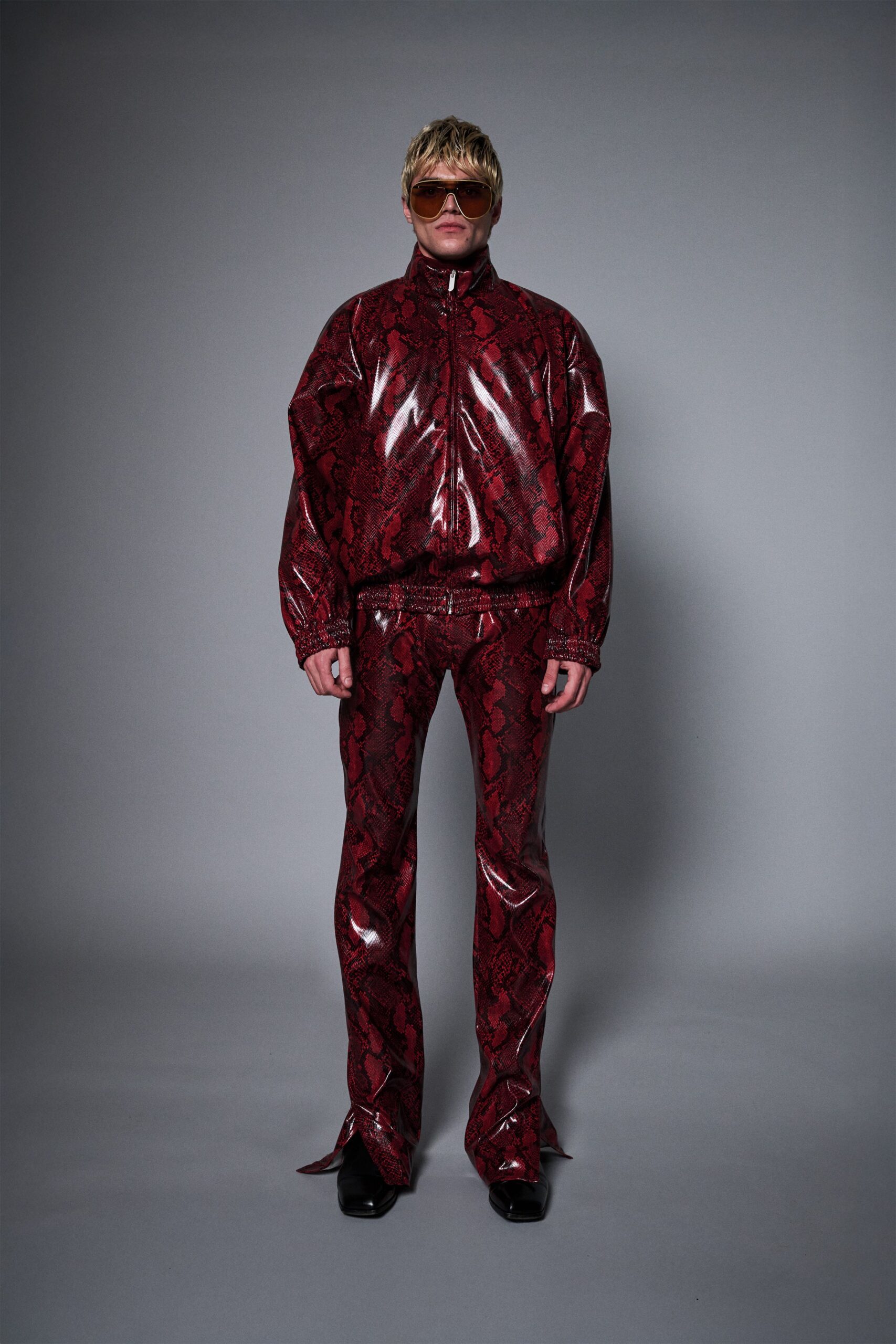 red vinyl long-sleeve collared oversized zippered printed jacket
