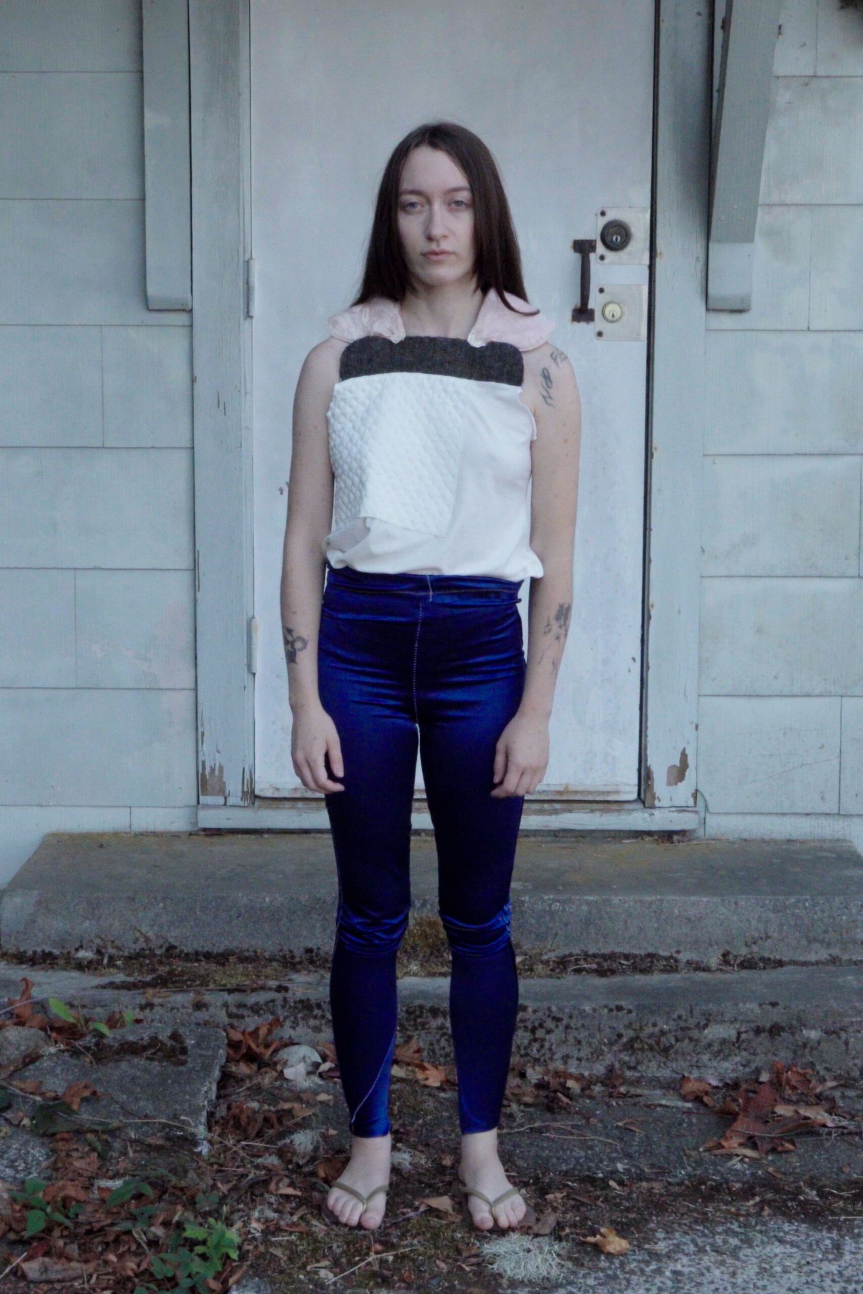 fitted white top with blue pants