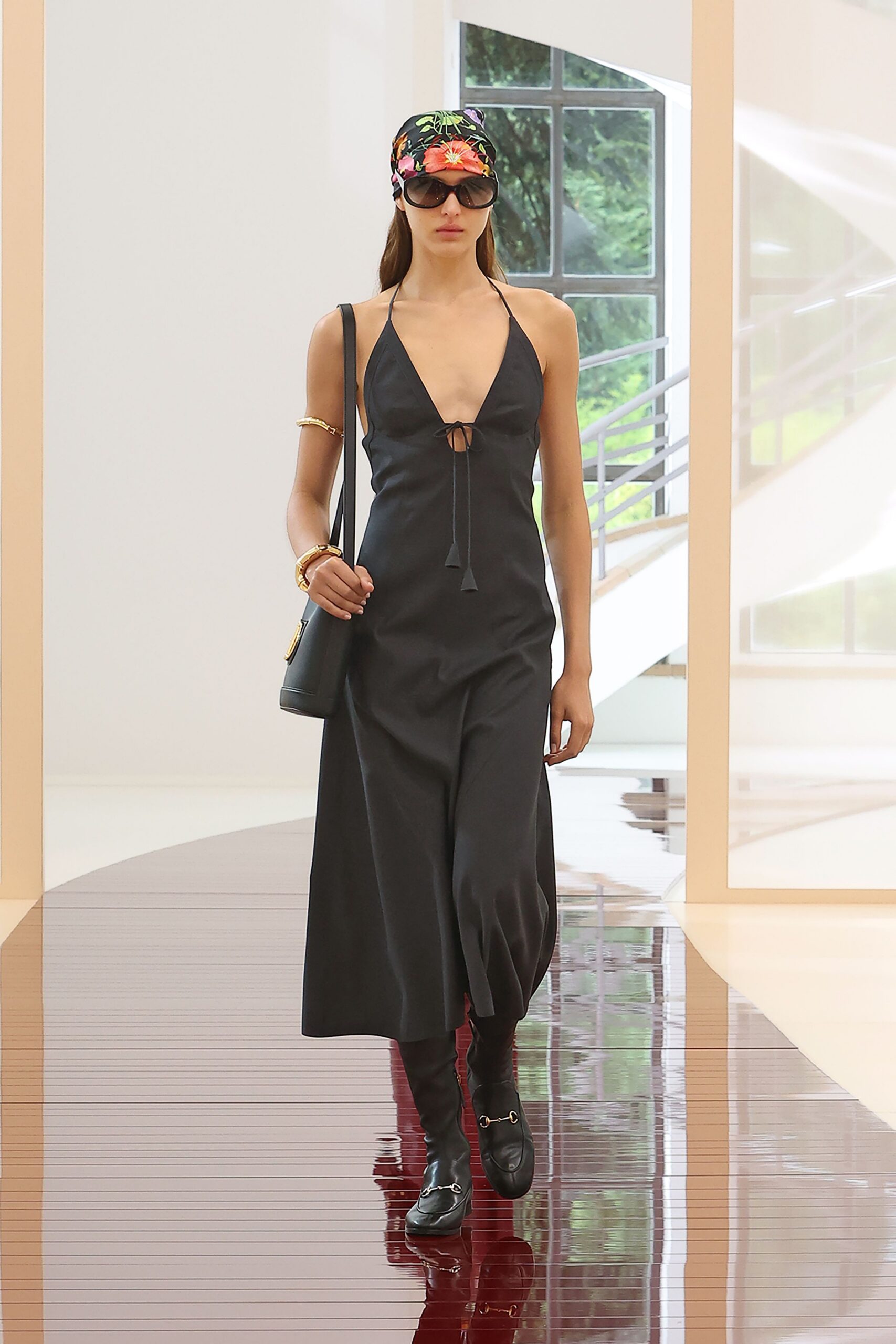black fitted midi dress with accessories