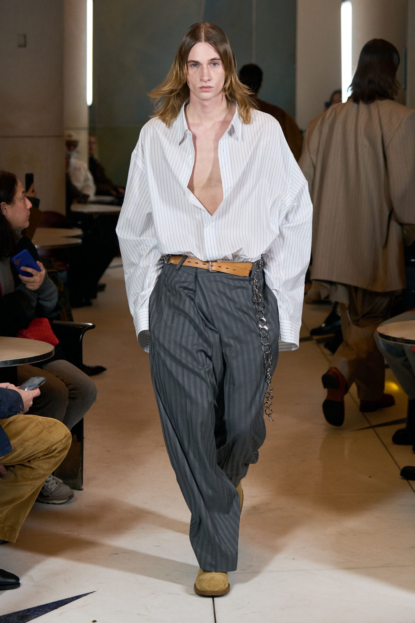 oversized striped shirt and relaxed pants