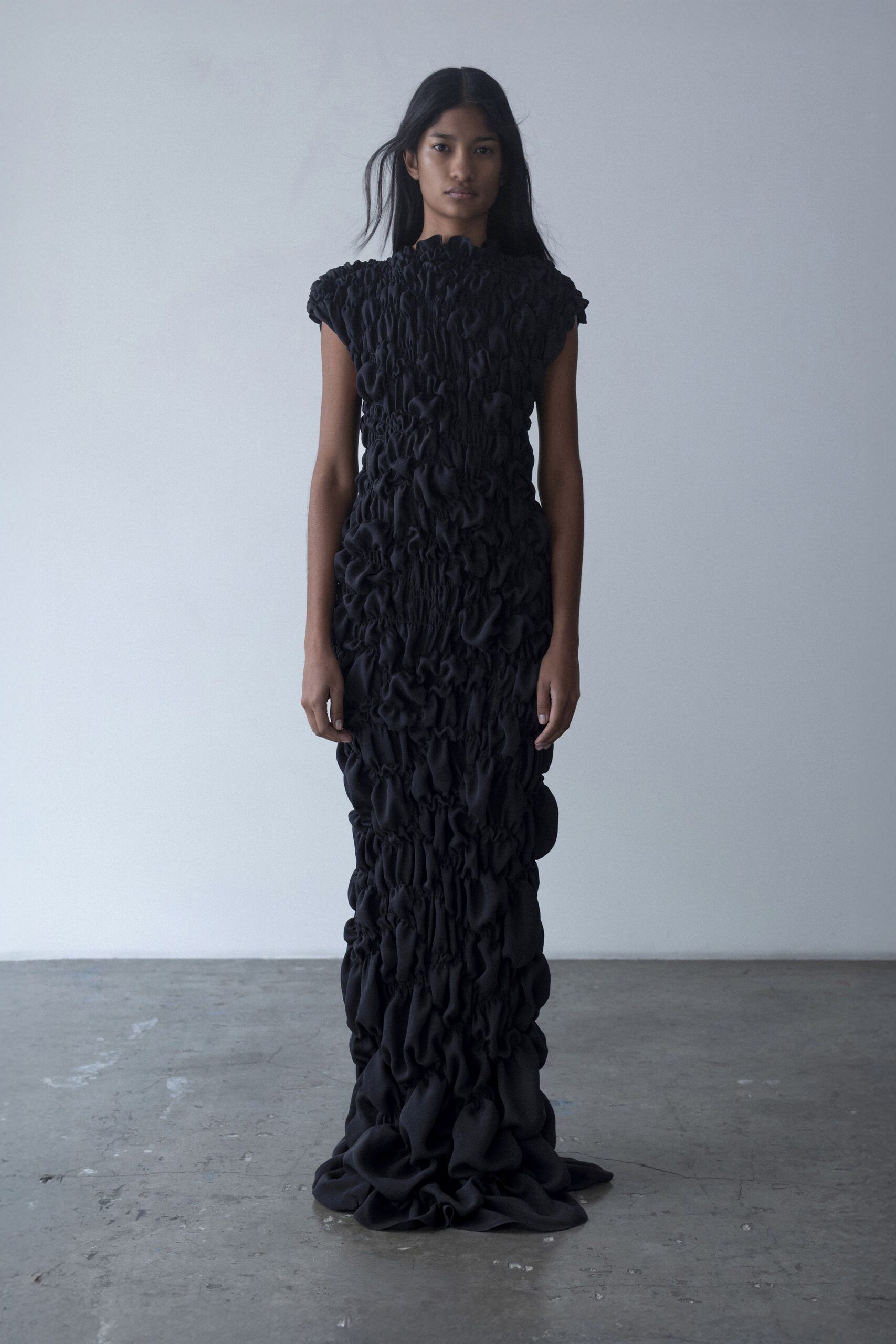 black silk sleeveless gown