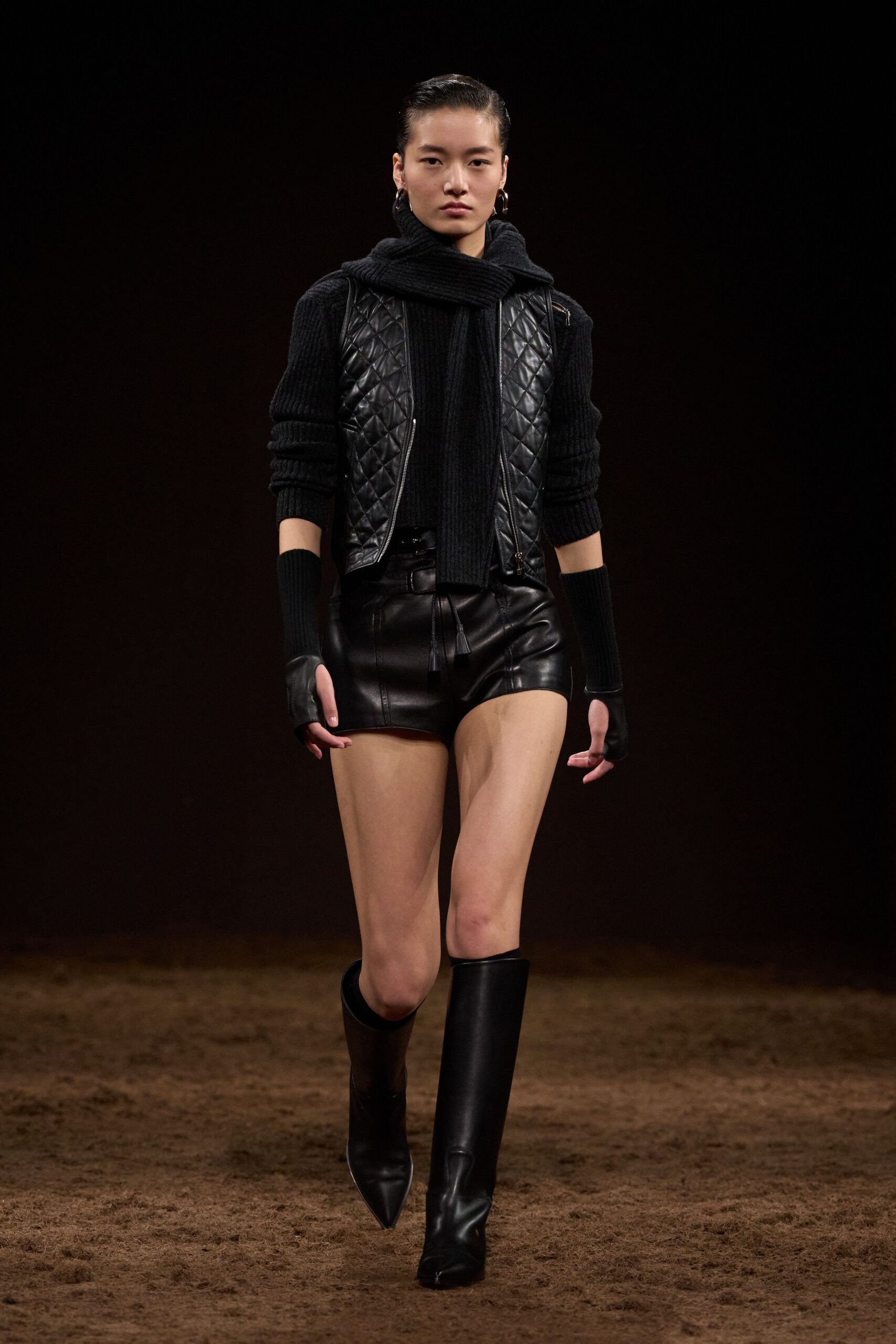 black leather vest and shorts