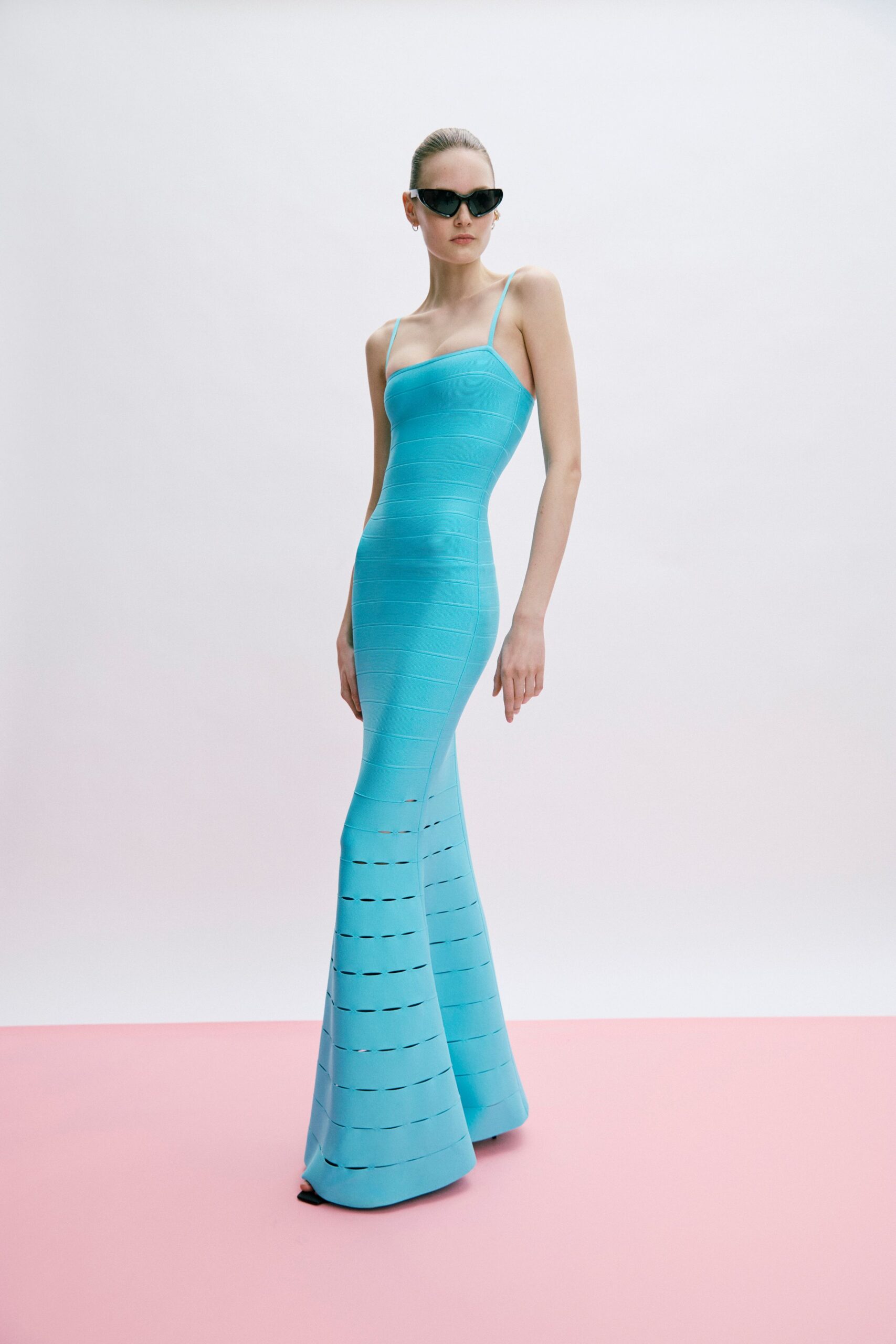 blue knit sleeveless v-neck fitted flared maxi gown