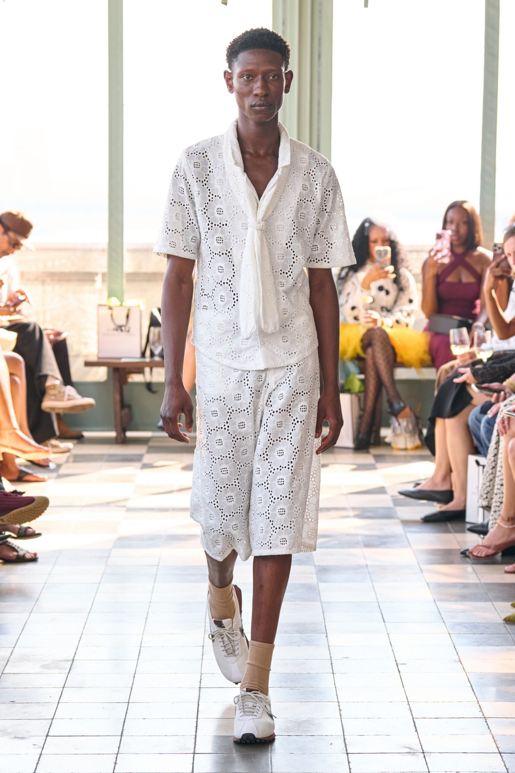 white embroidered shirt and shorts