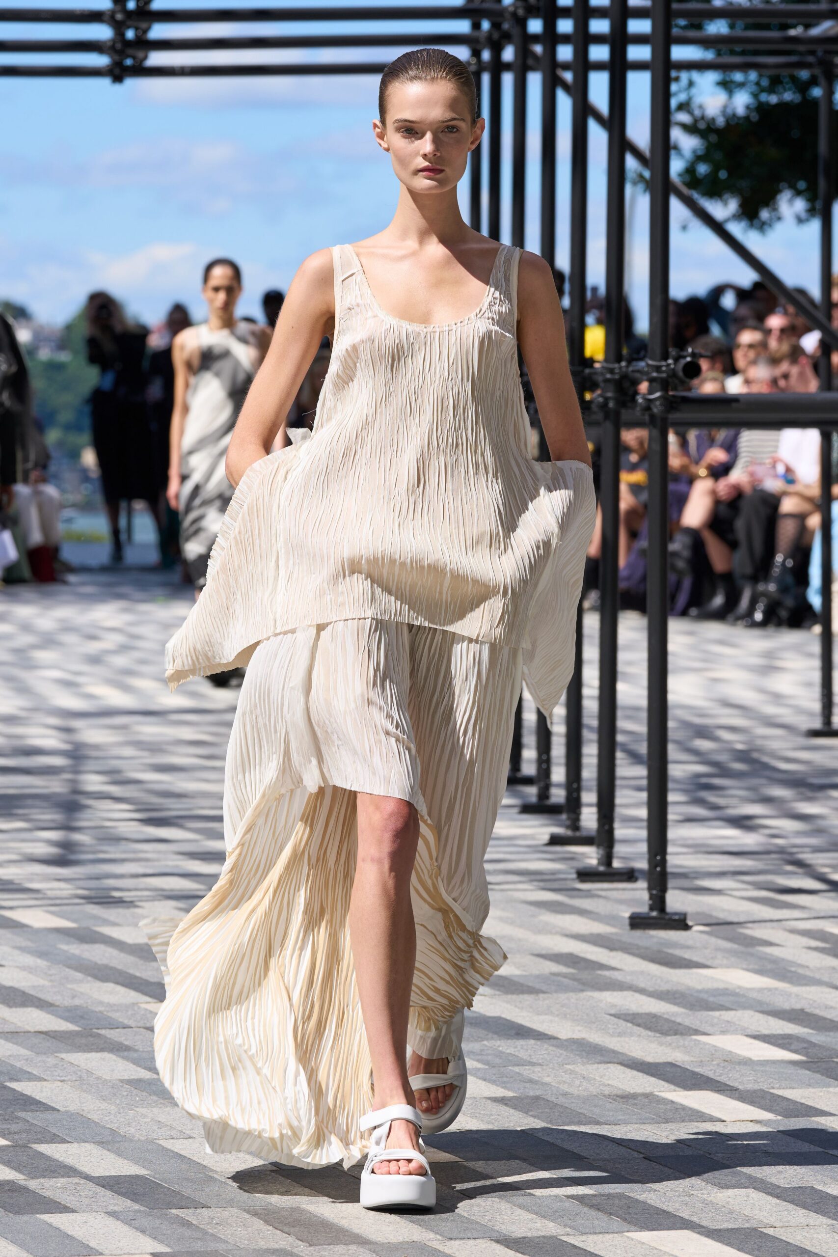 beige silk sleeveless v-neck relaxed pleated flowing dress
