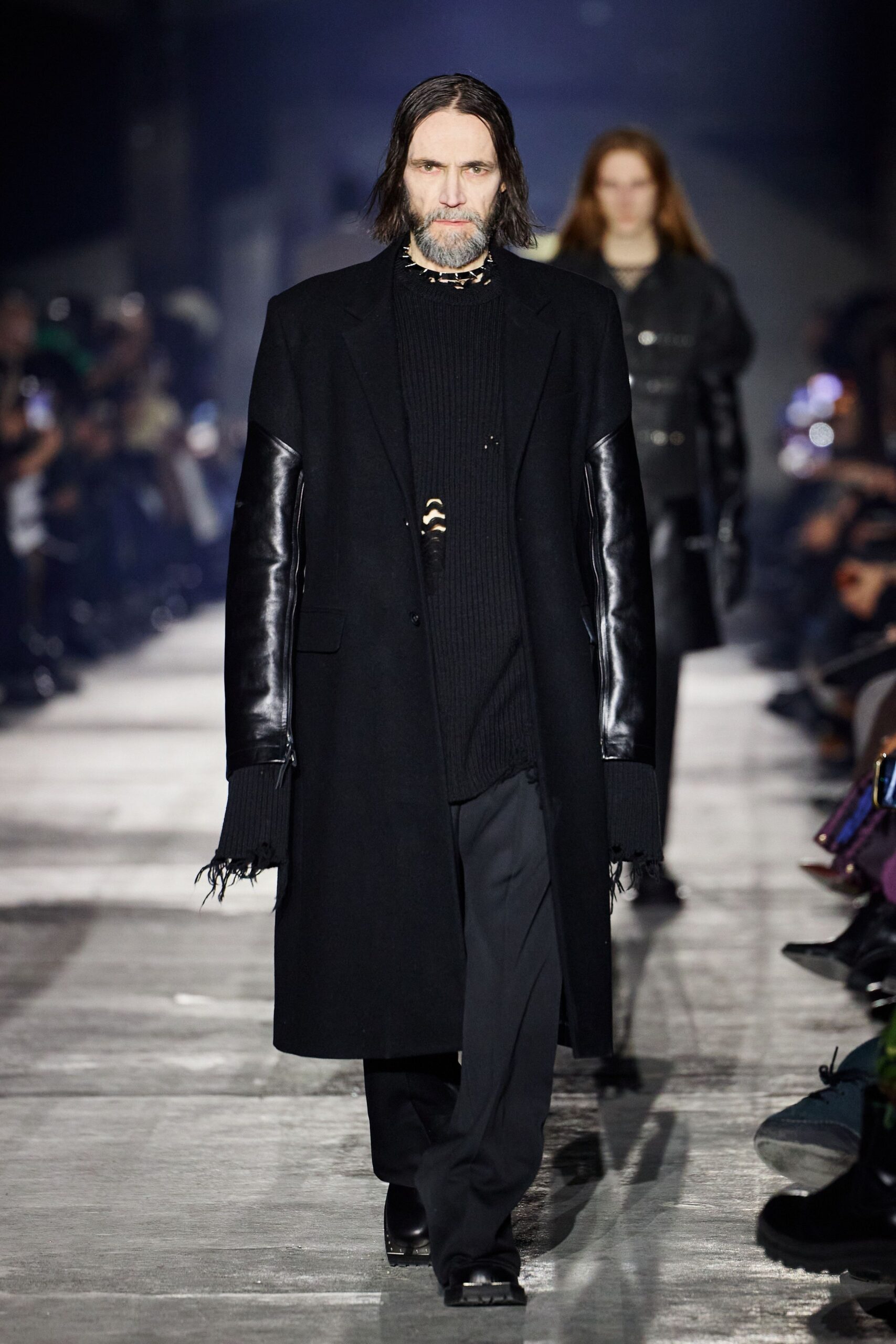 black wool coat with fringed sweater