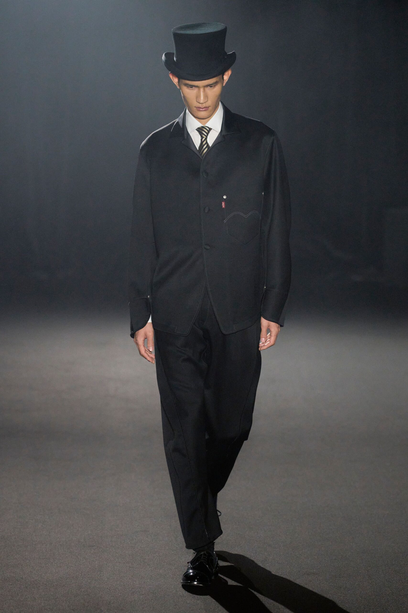 black tailored suit with hat