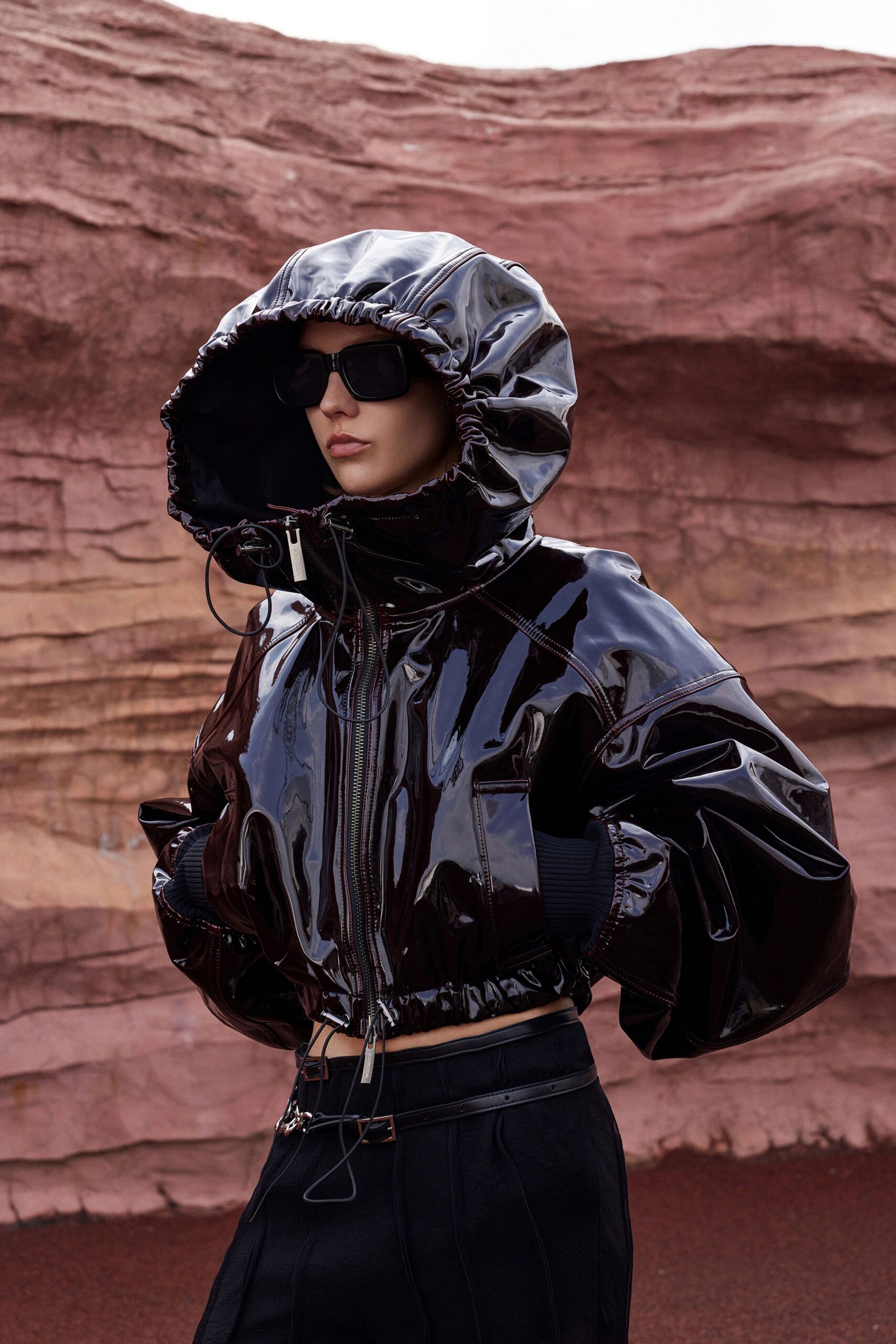 black vinyl hooded long-sleeve relaxed zippered padded jacket