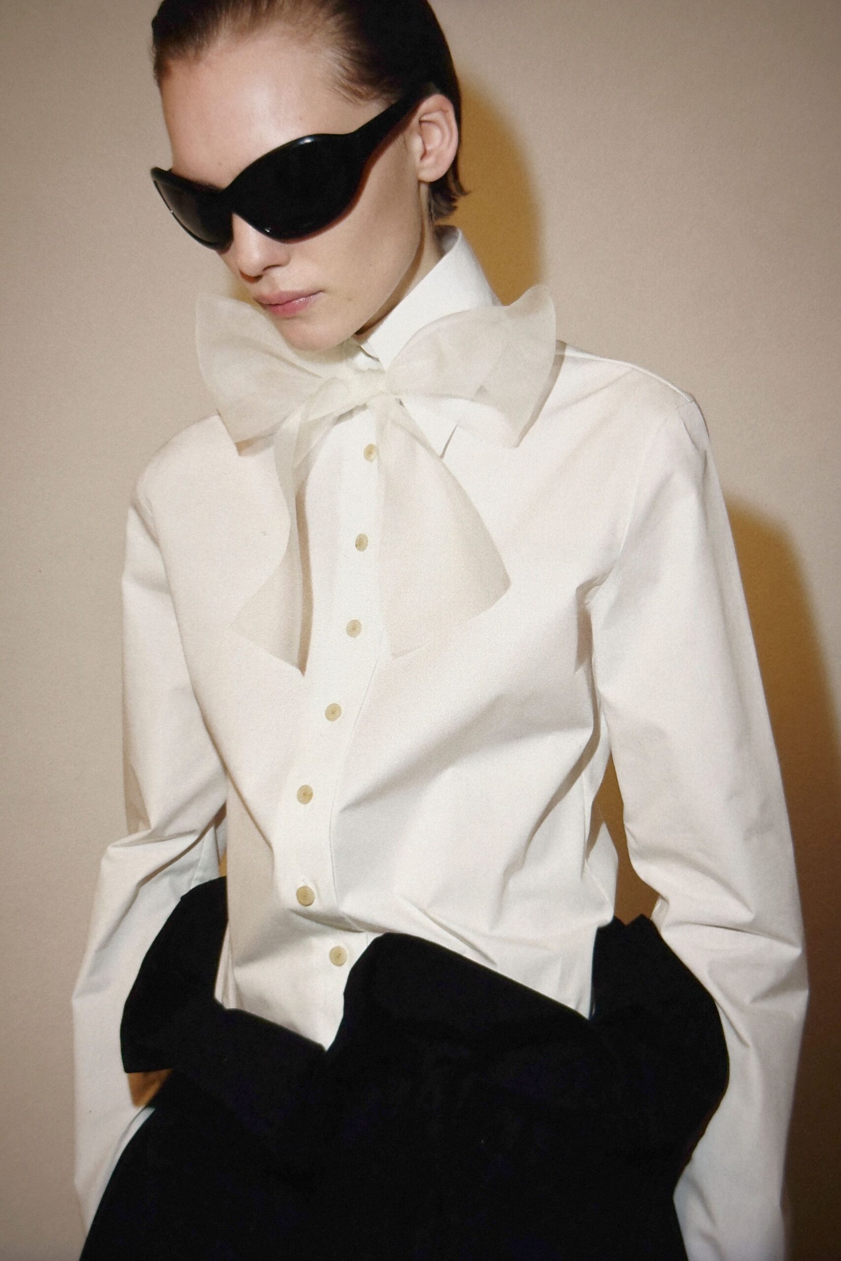 white fitted shirt black pants