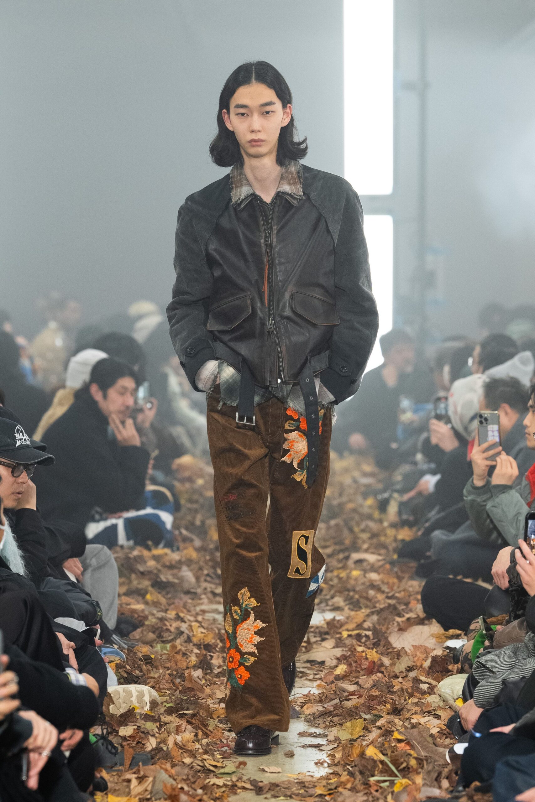 black leather jacket with embroidered pants