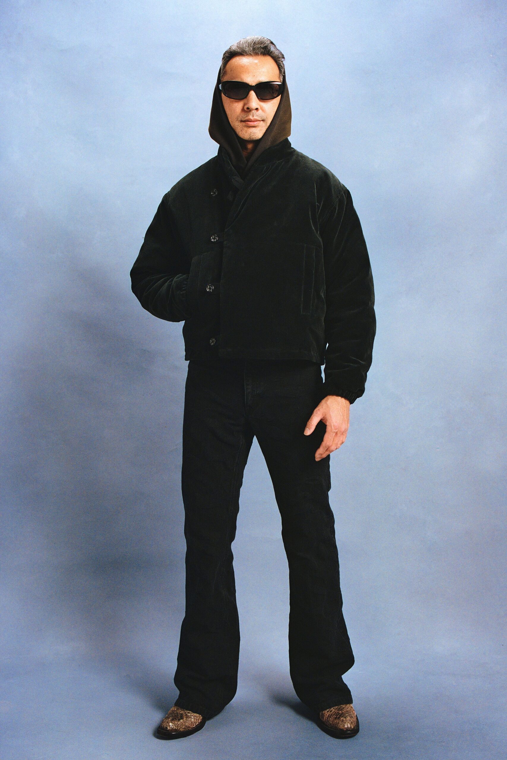 black fitted jacket with flared pants