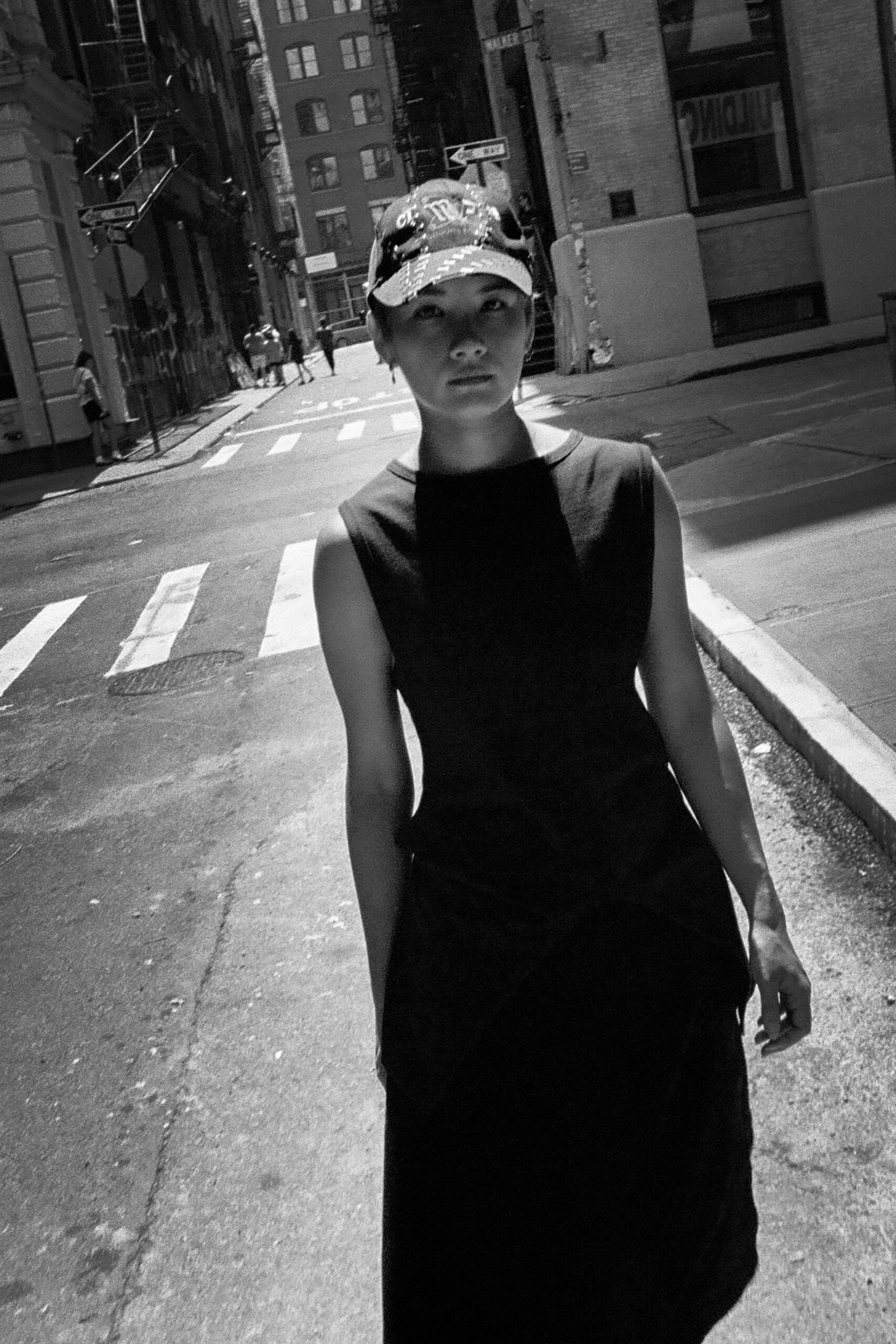 black fitted midi dress with hat