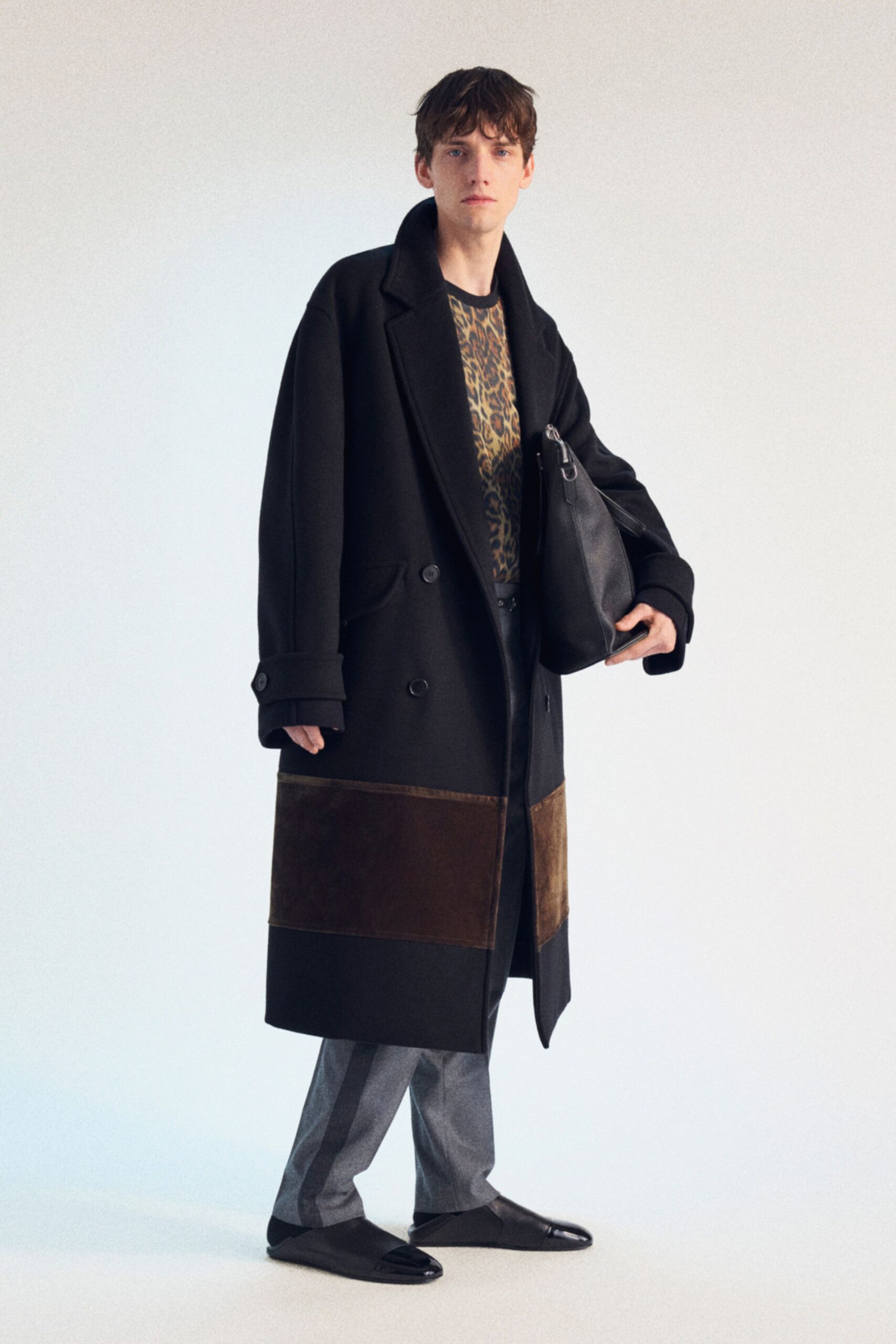 black wool coat with printed shirt