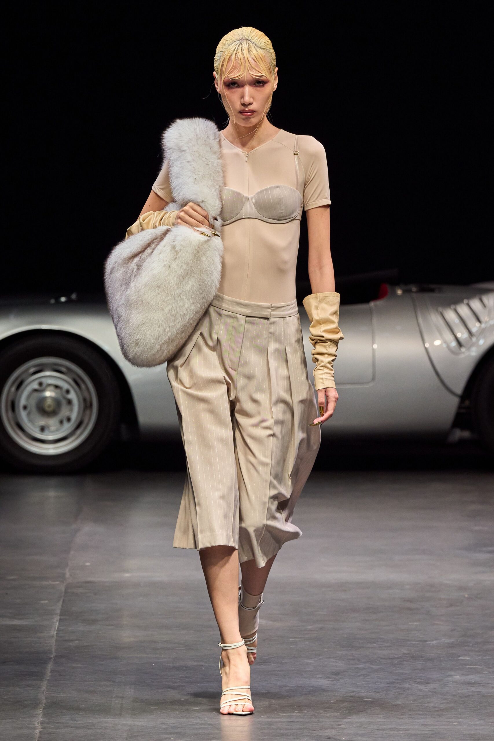 beige silk sleeveless high-neck fitted ruched bodysuit