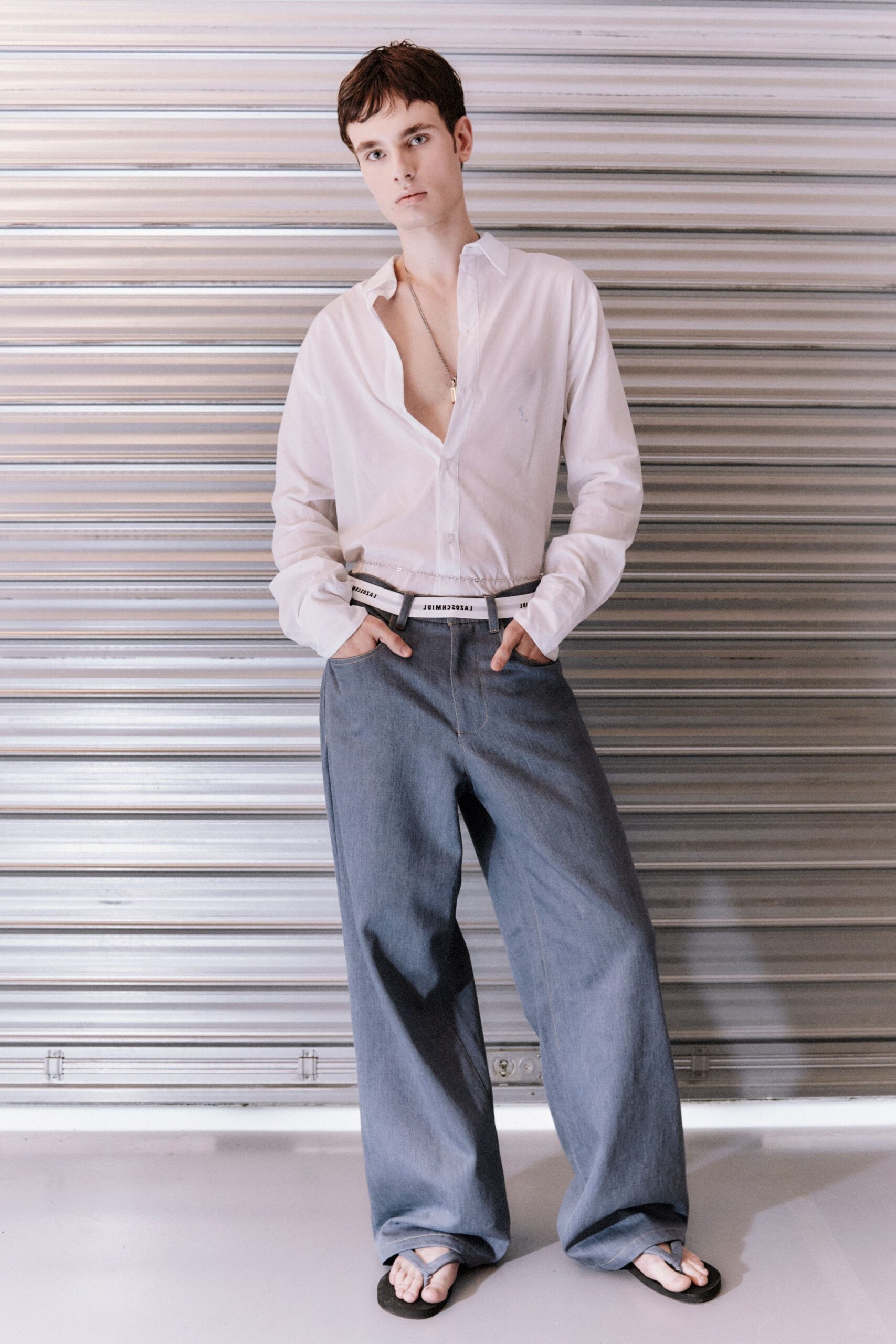 white relaxed shirt with blue denim pants