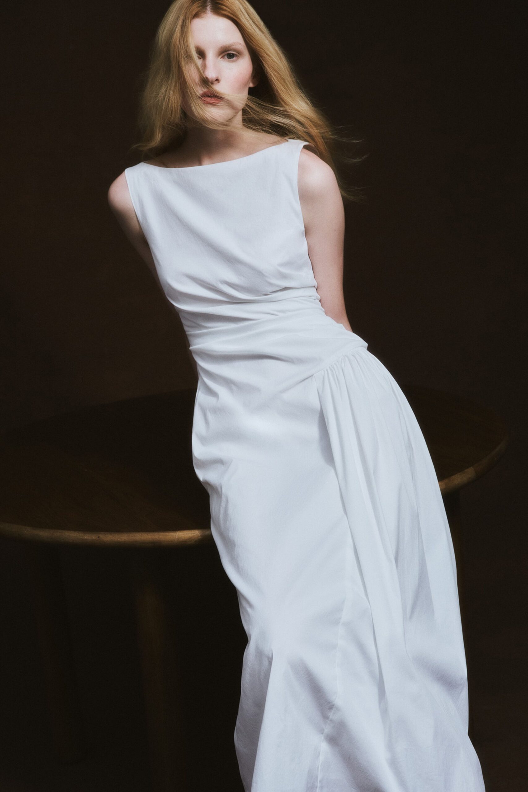white fitted sleeveless gown