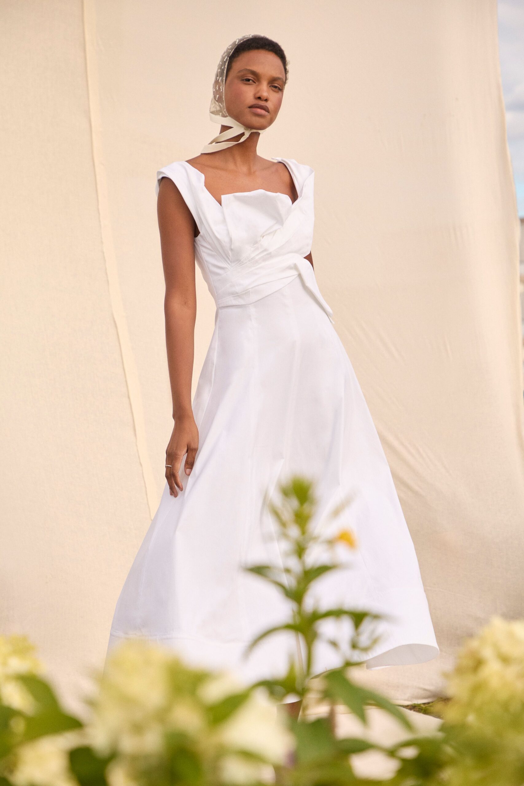 white fitted gown with scarf