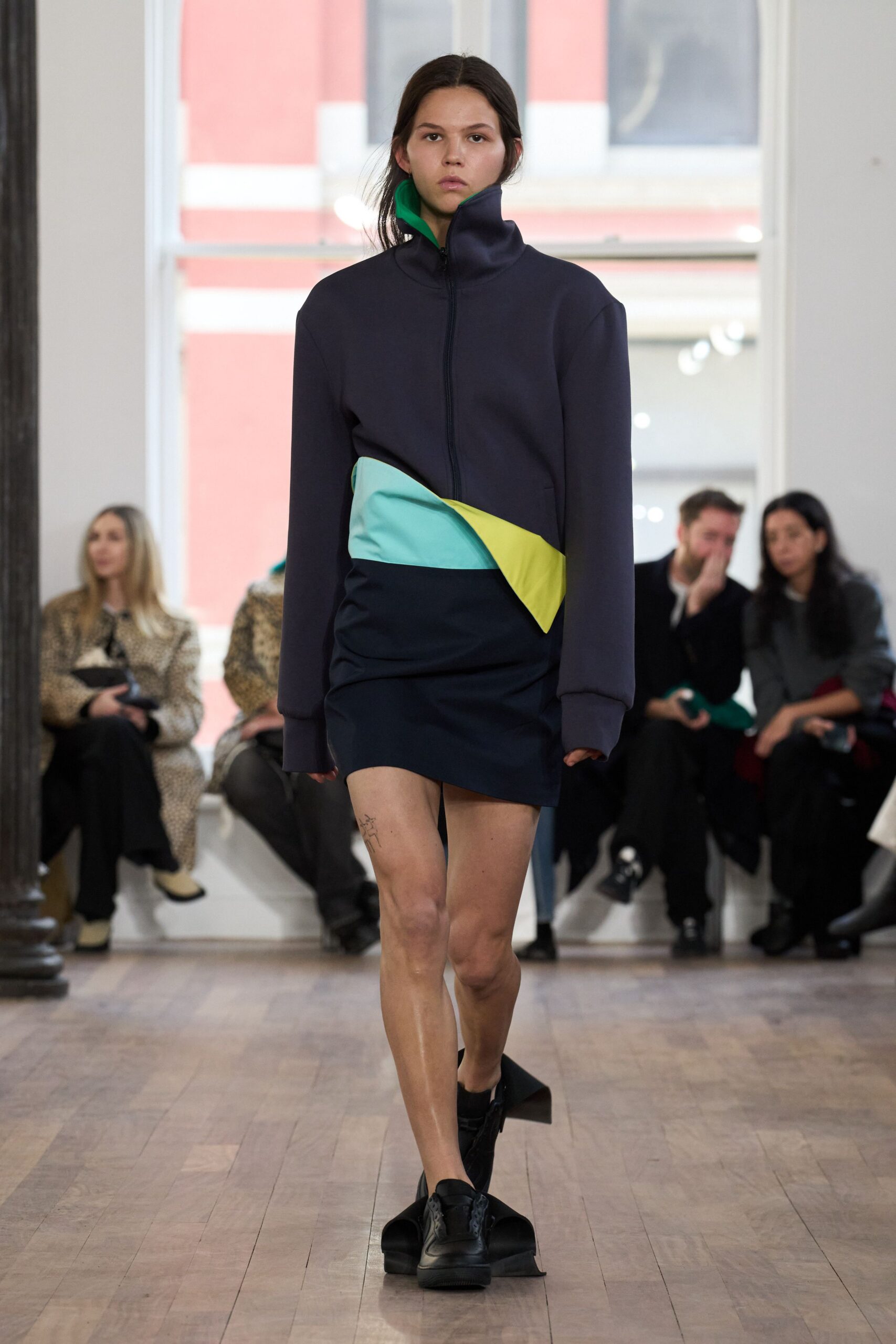 color-blocked mini dress with black shoes
