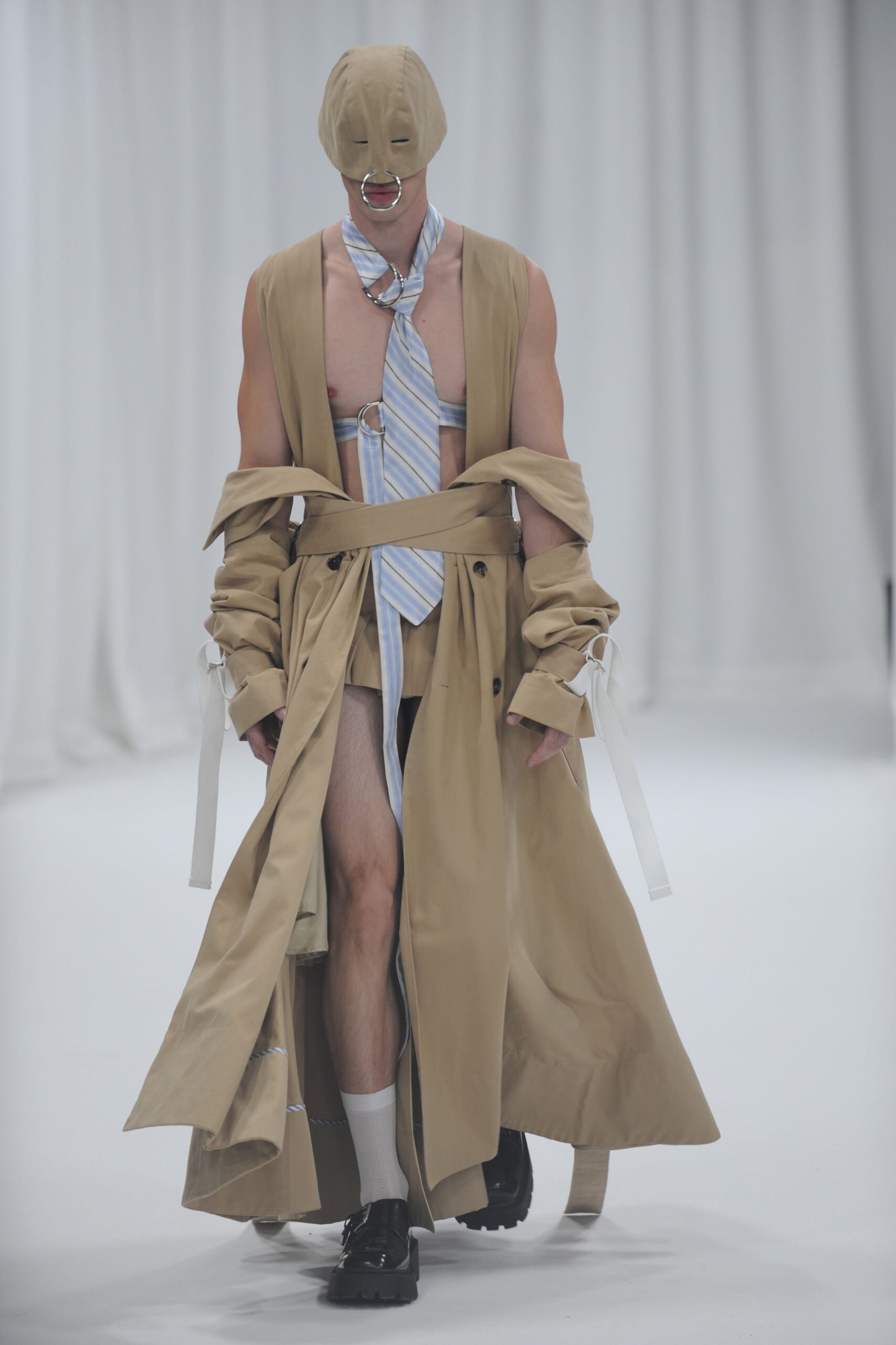 beige coat with blue shirt