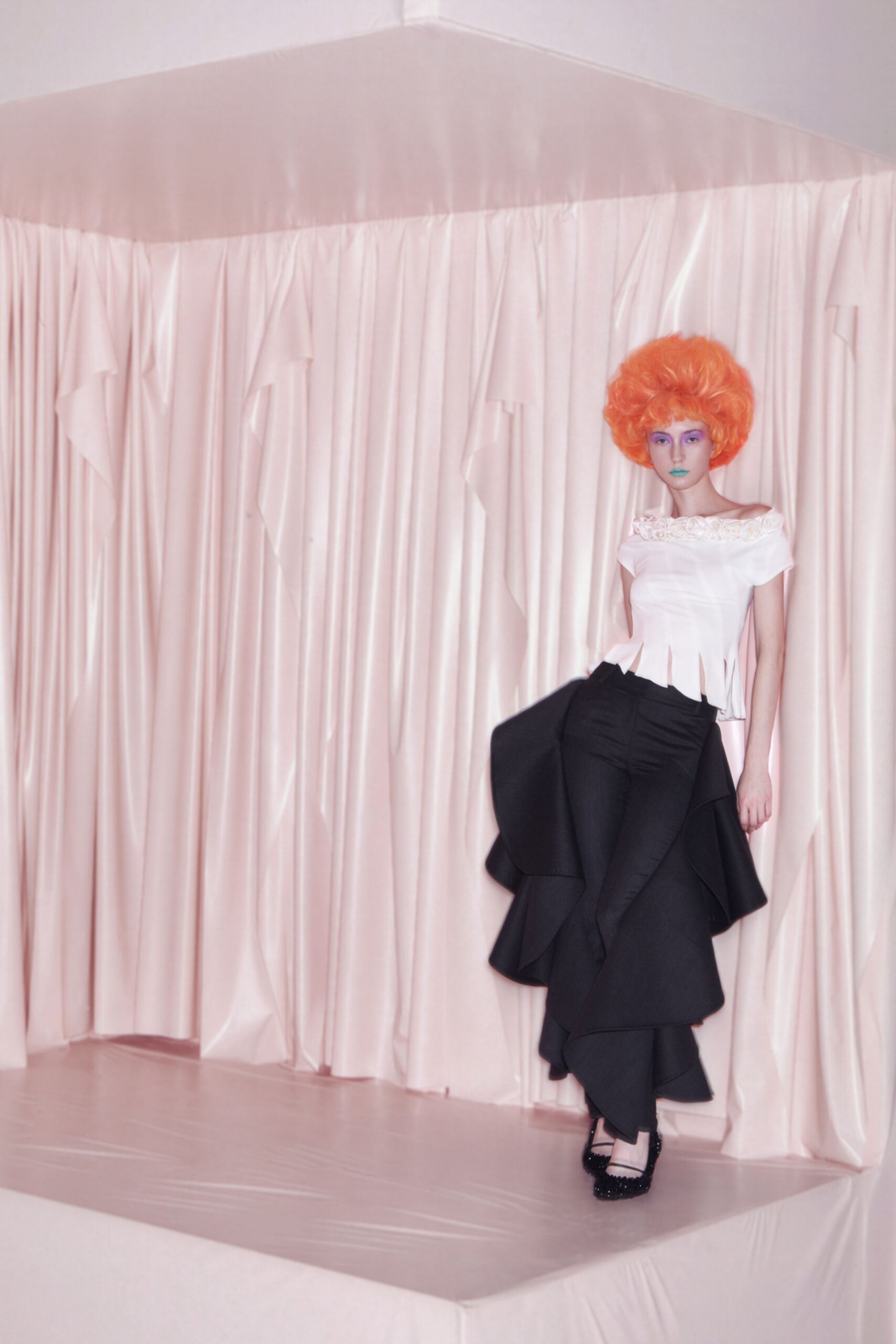 white fitted top black flared pants