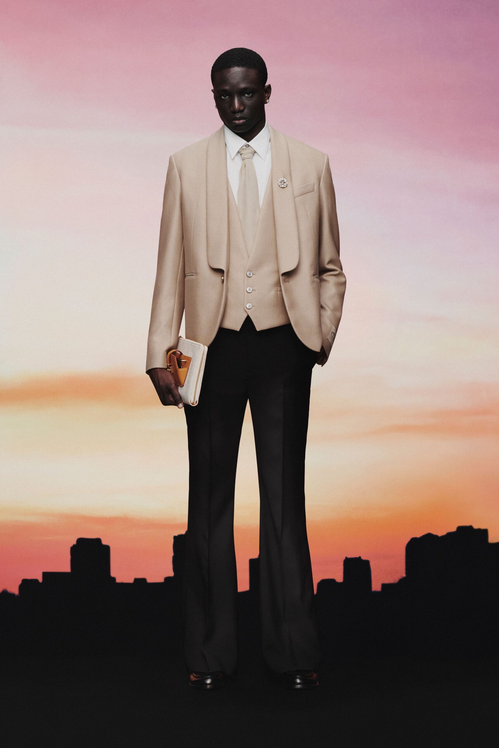 beige tailored blazer with black pants