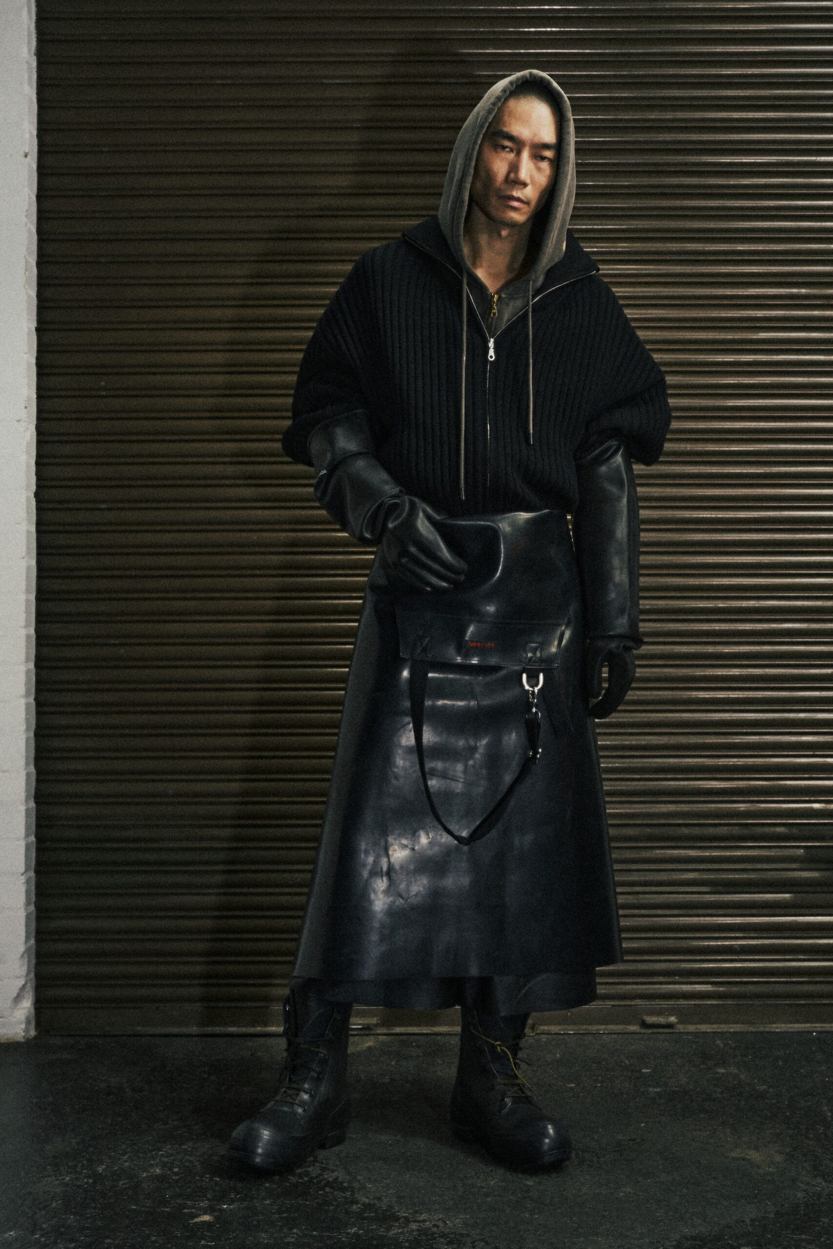 black hoodie and vinyl skirt
