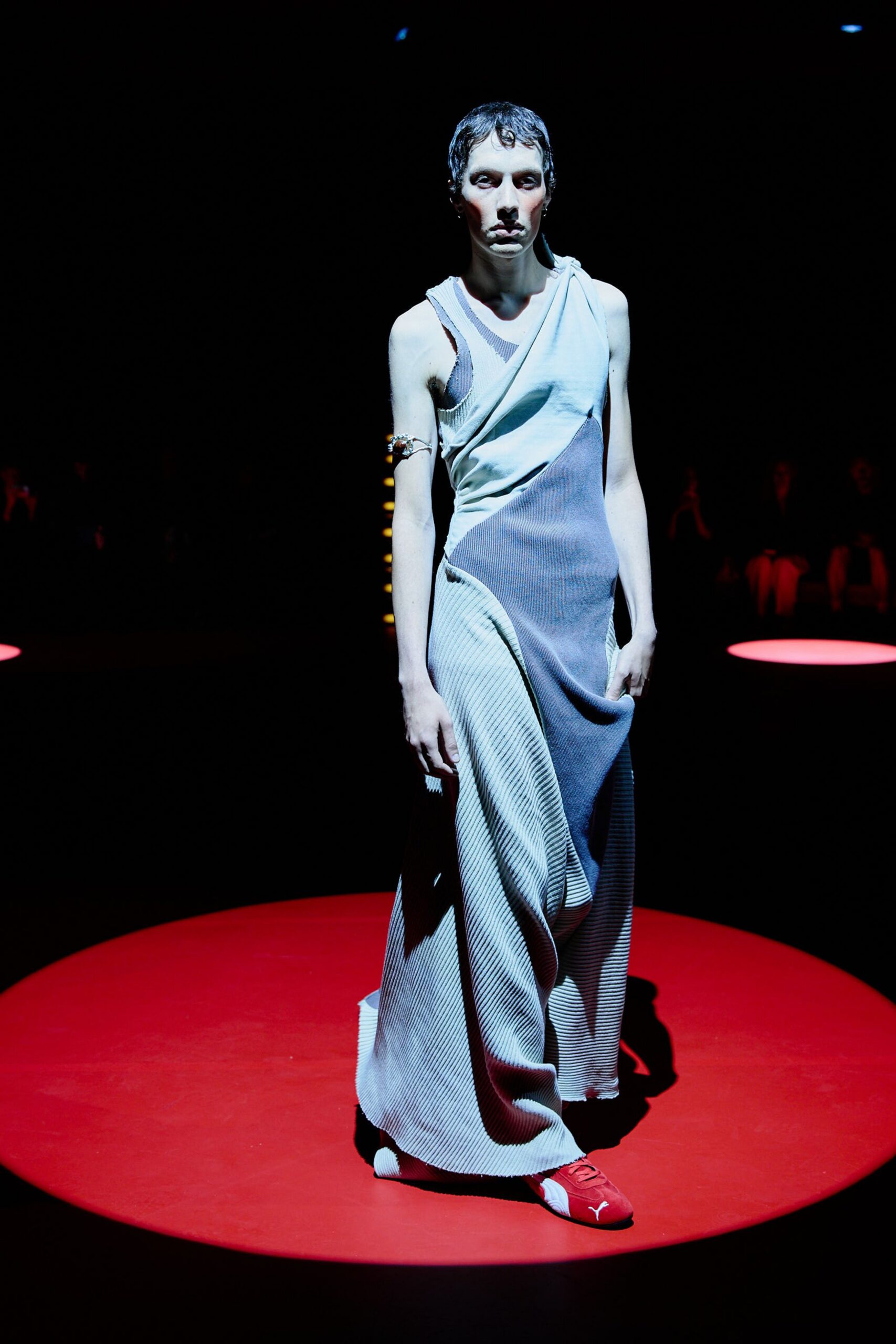 gray draped maxi dress with red shoes