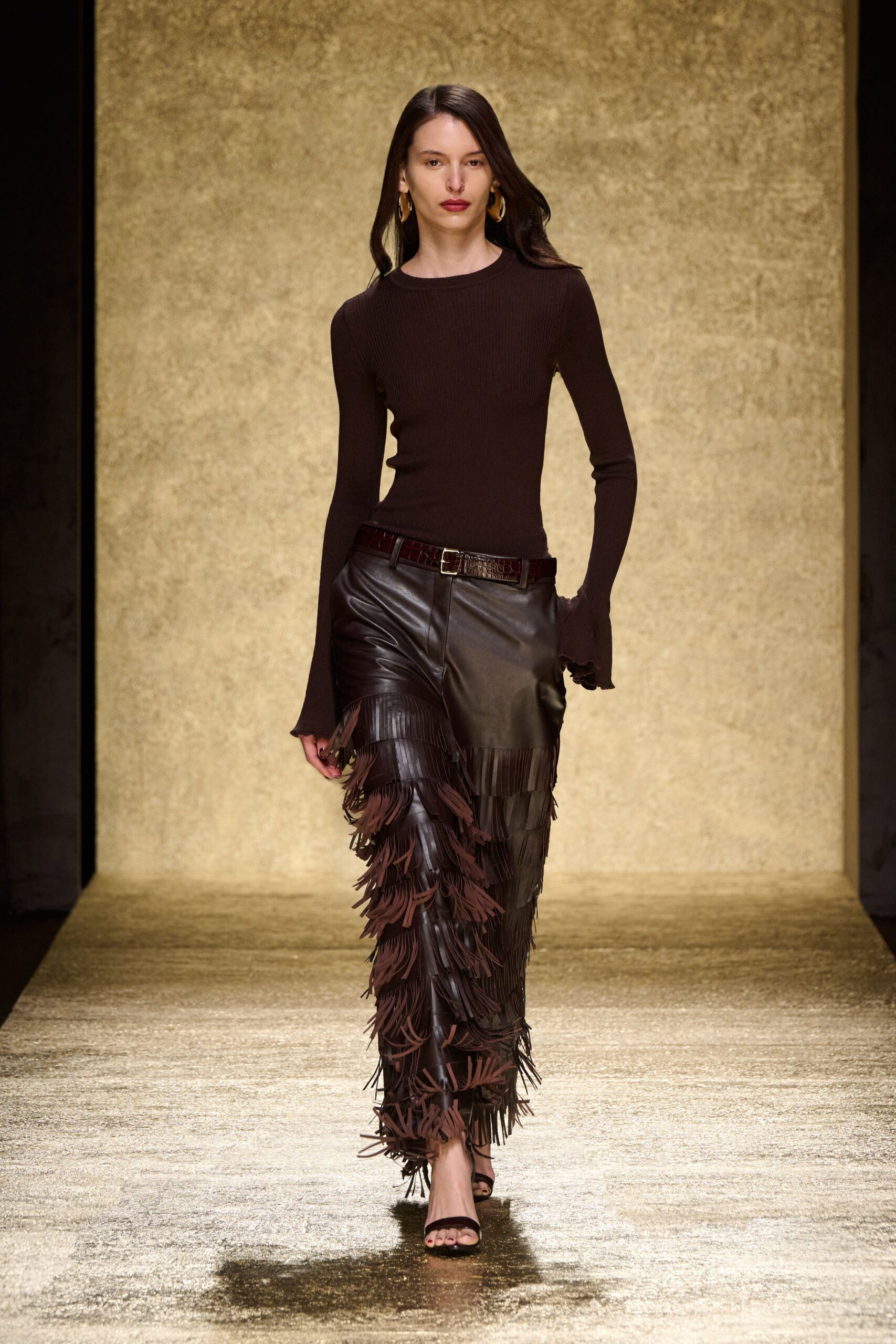 brown fitted top black fringed skirt