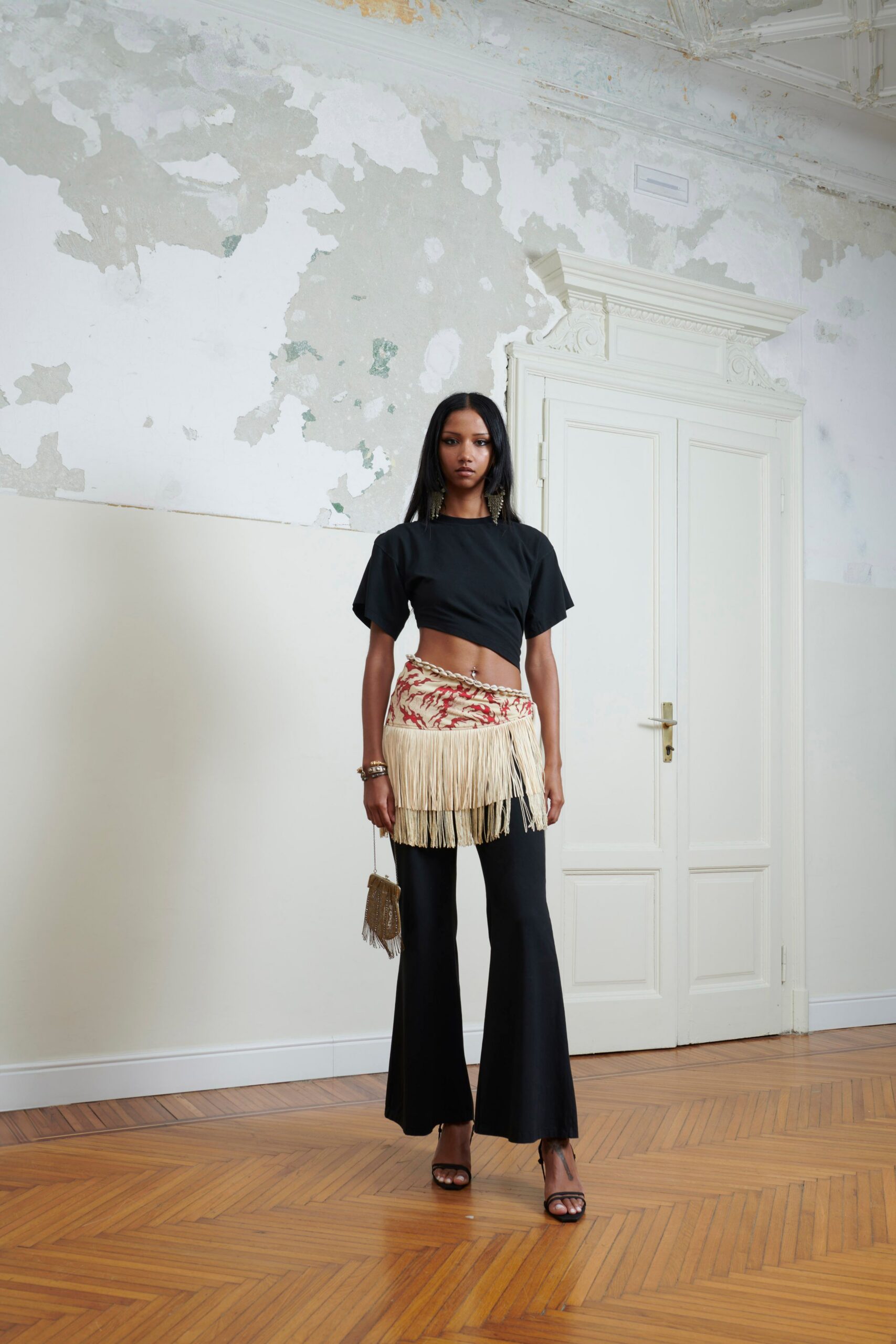 black cropped top with fringed skirt