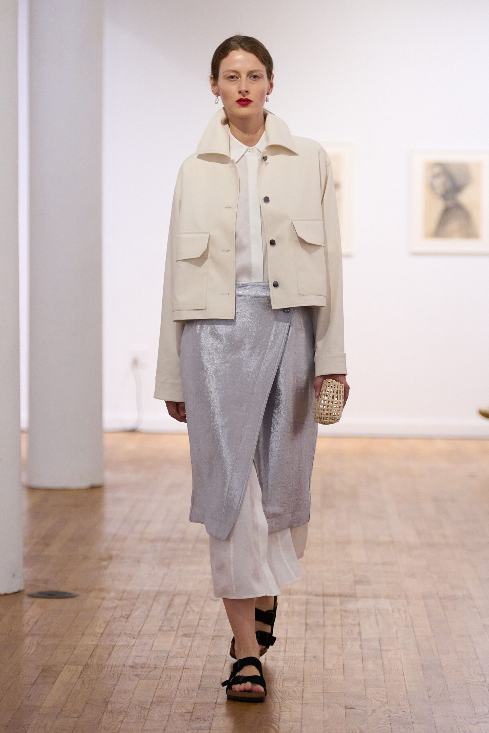 white jacket and gray skirt