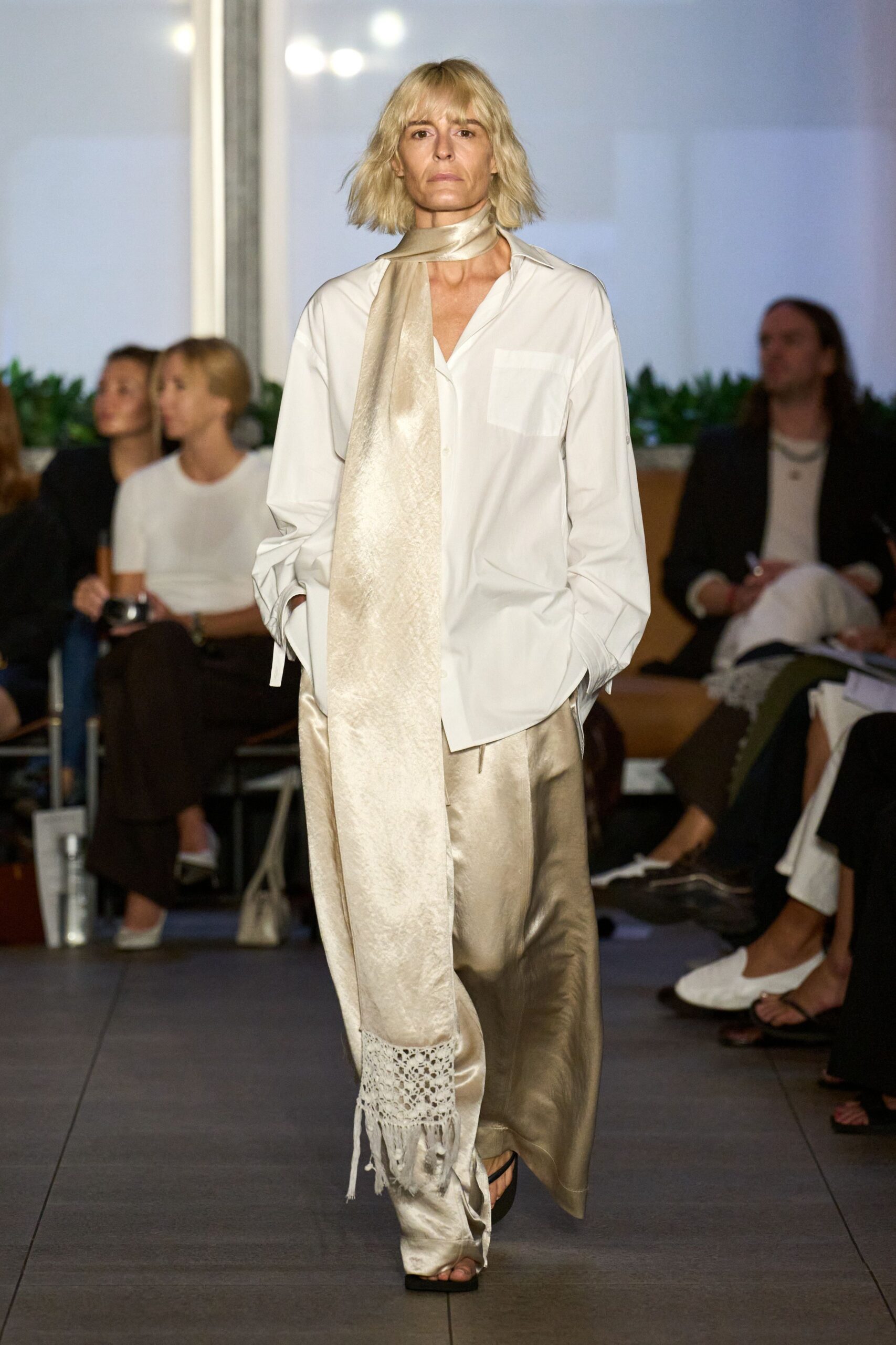 white shirt beige pants black shoes