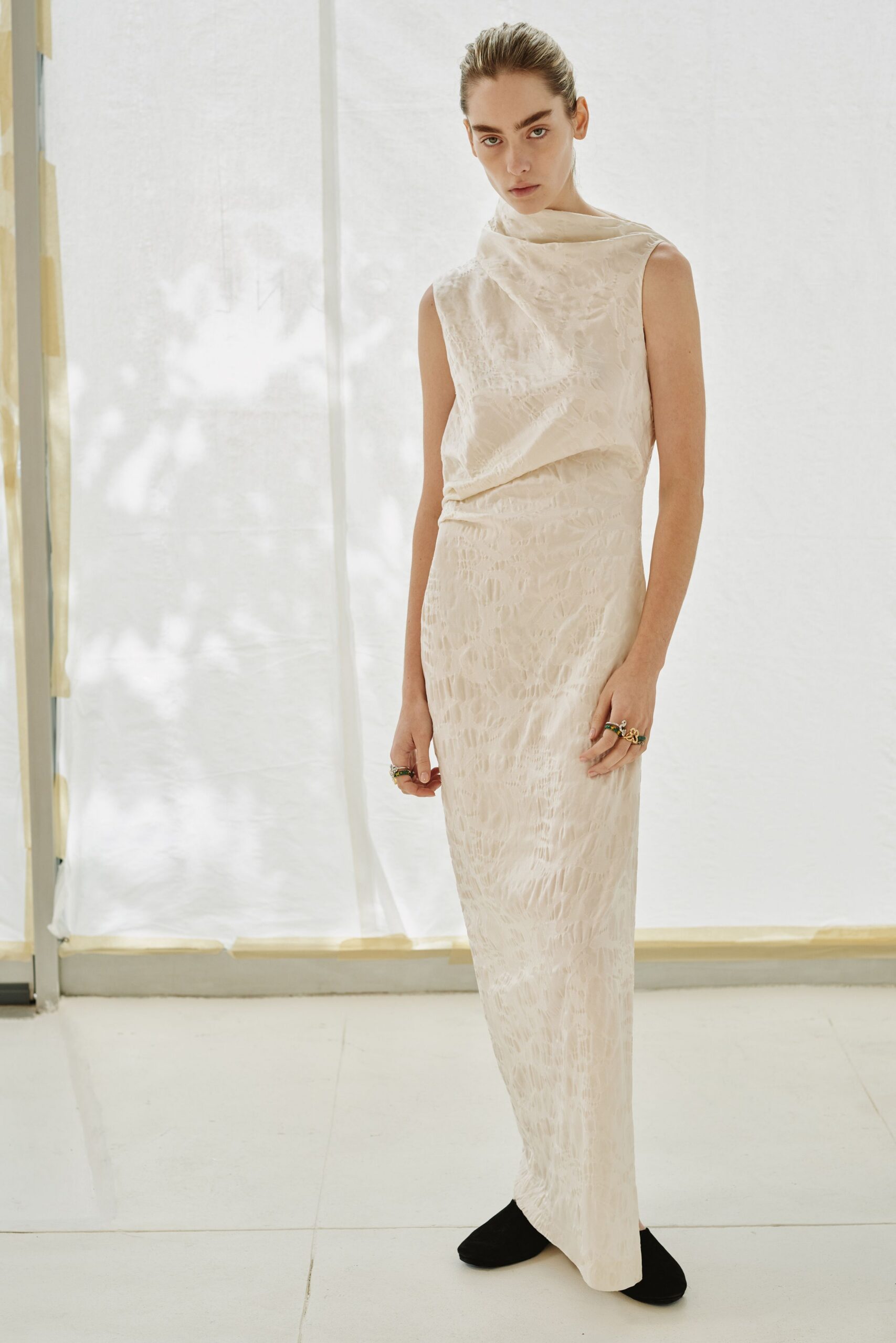 ivory silk sleeveless high-neck fitted textured maxi gown